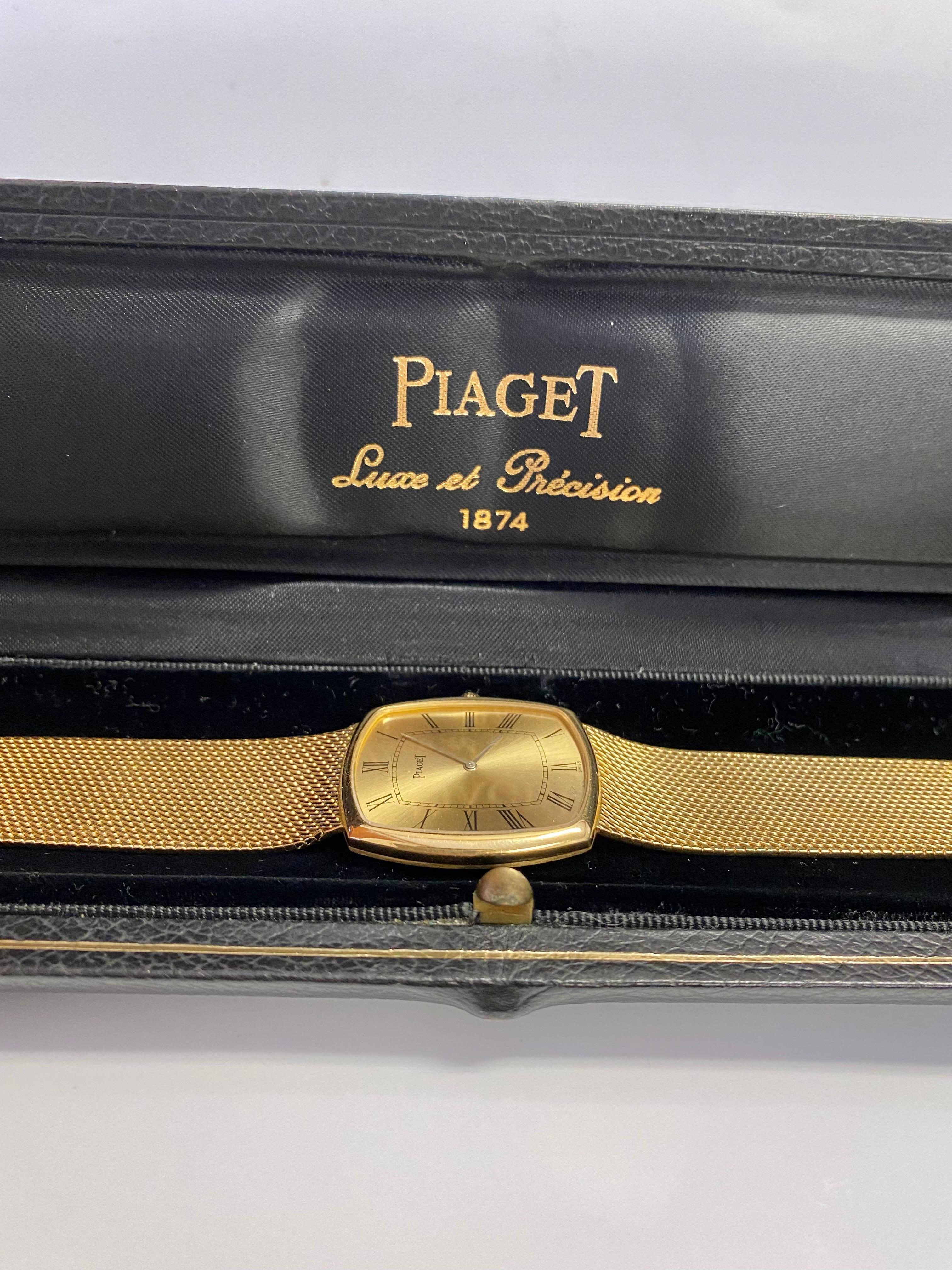 Piaget signed 18k solid gold vintage wristwatch. This vintage unisex watch is in near mint condition with little to no signs of wear to the naked eye. The dial in particular is of superlative condition. With elongated Roman Numeral hour markers and