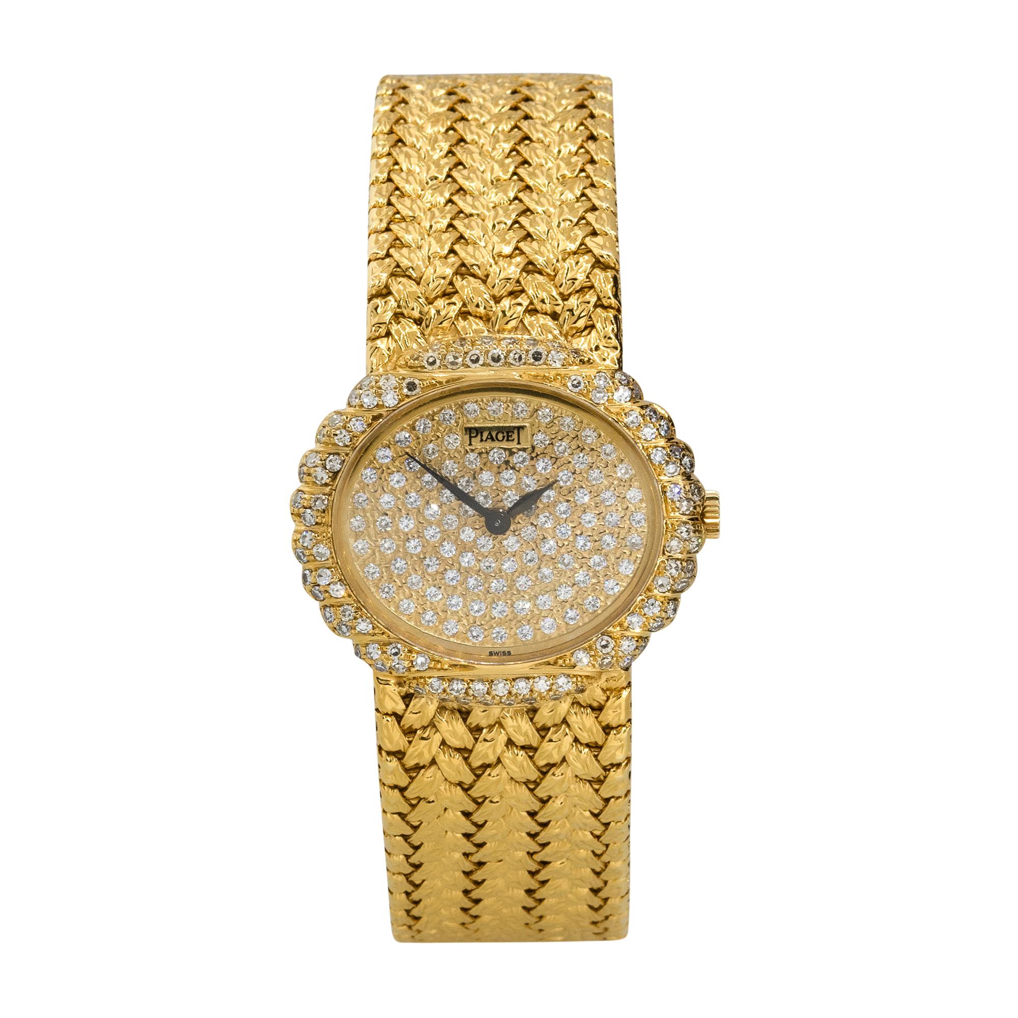 Brand: Piaget
Case Material: 18k Yellow Gold
Case Diameter: 27mm
Crystal: Sapphire Crystal
Bezel: 18k Yellow Gold Diamond bezel
Dial: Yellow gold Diamond pave dial
Bracelet: 18k Yellow Gold bracelet
Size: Will fit a 5.5
