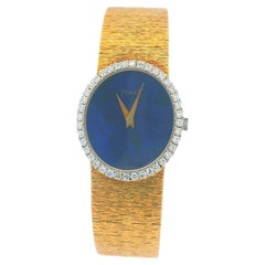 Piaget 9826A6 18K Gold Lapis Dial & Diamond Bezel Ladies Watch