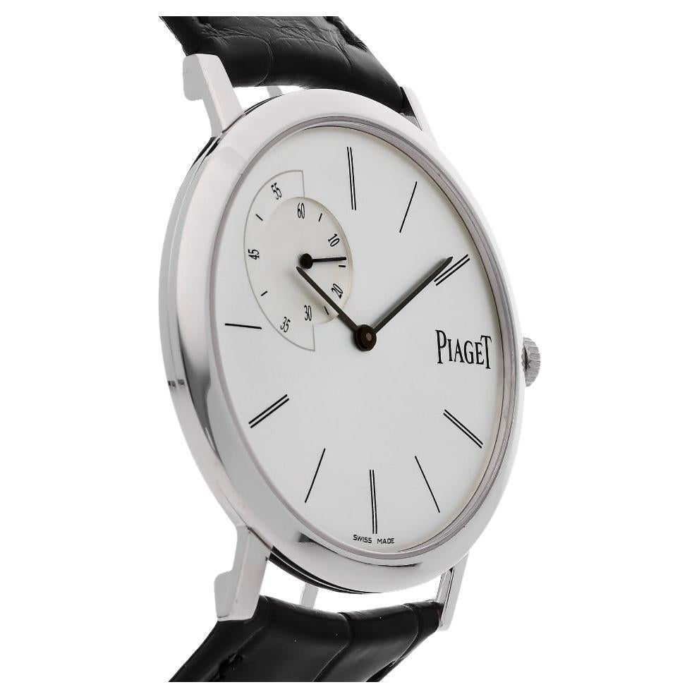 Pre-Owned Piaget Altiplano (GOA33112) manual wind watch, features a 40mm 18k white gold case surrounding a silver dial on a brand new black alligator strap with an 18k white gold tang buckle. Functions include hours, minutes and small seconds. This