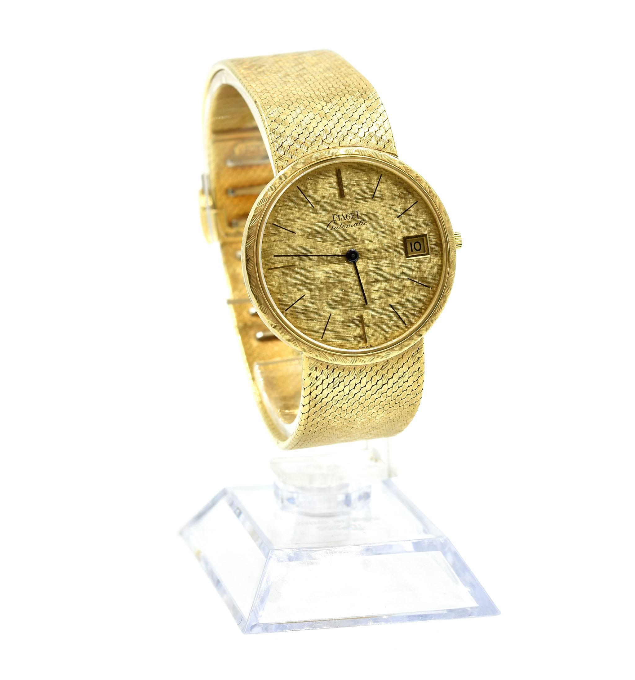 Movement: mechanical
Function: hours, minutes, date
Case: round 32mm 18k yellow gold case with fixed bezel, plastic protective crystal, winding crown
Dial: gold dial with blued steel hands, gold stick hour markers, date at 3 o’clock
Band: 18k yellow