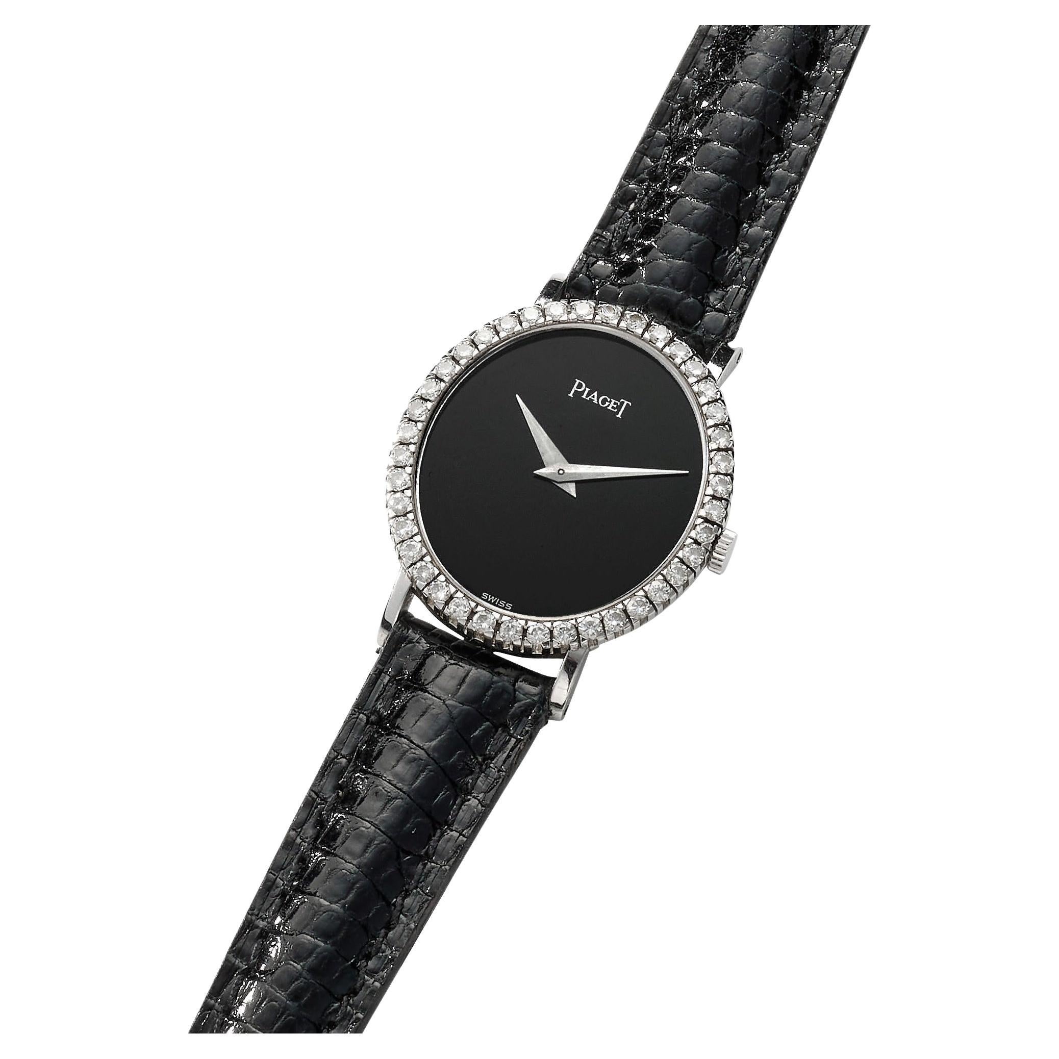 How do I wind a Piaget watch?