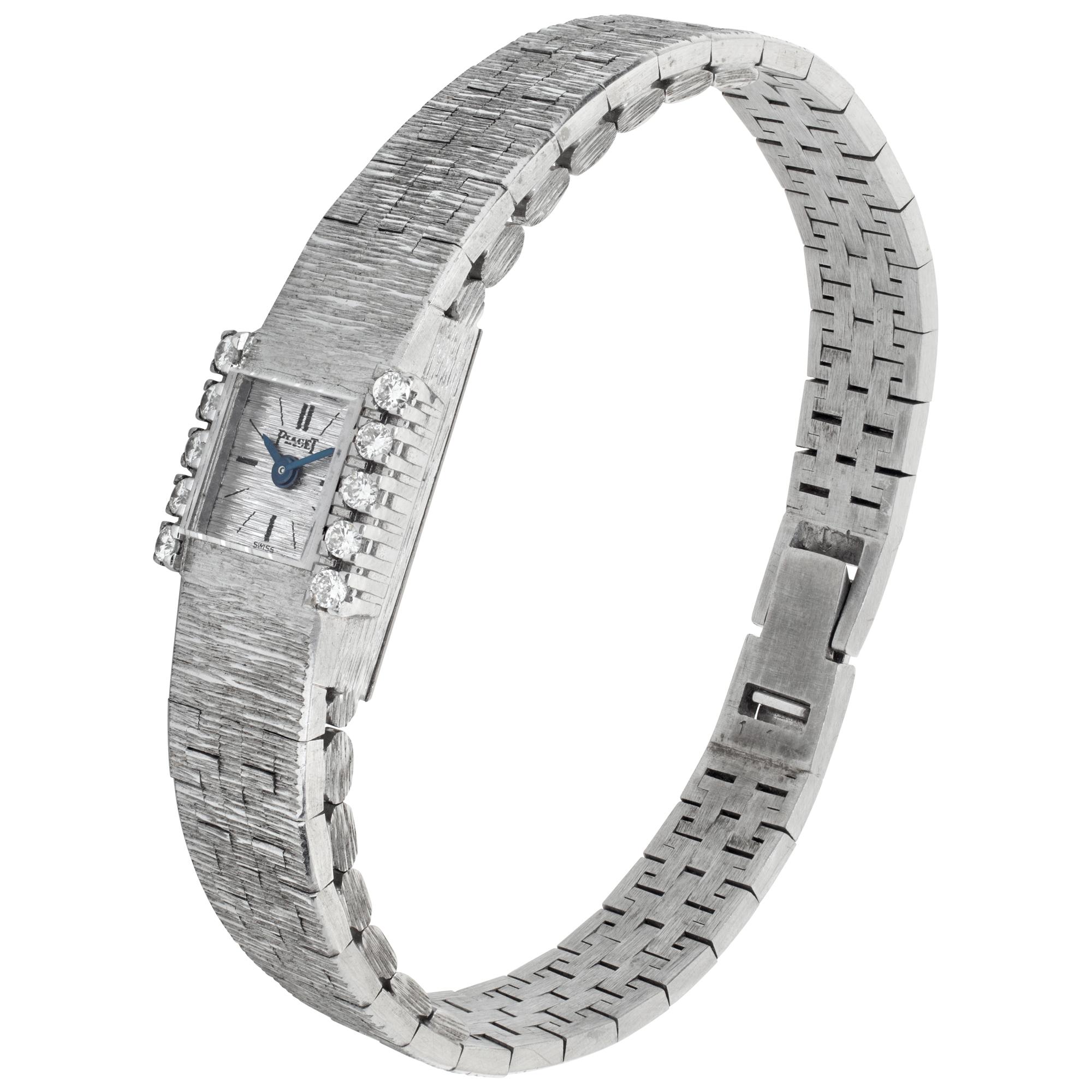 Piaget Ladies Classique cocktail watch in 18k white gold with diamond bezel and 6 inch 18k white gold bracelet. Manual. 10 mm case size. Ref 1018 AG. Fine Pre-owned Piaget Watch.

 Certified preowned Classic Piaget Classic 1018 AG watch is made out