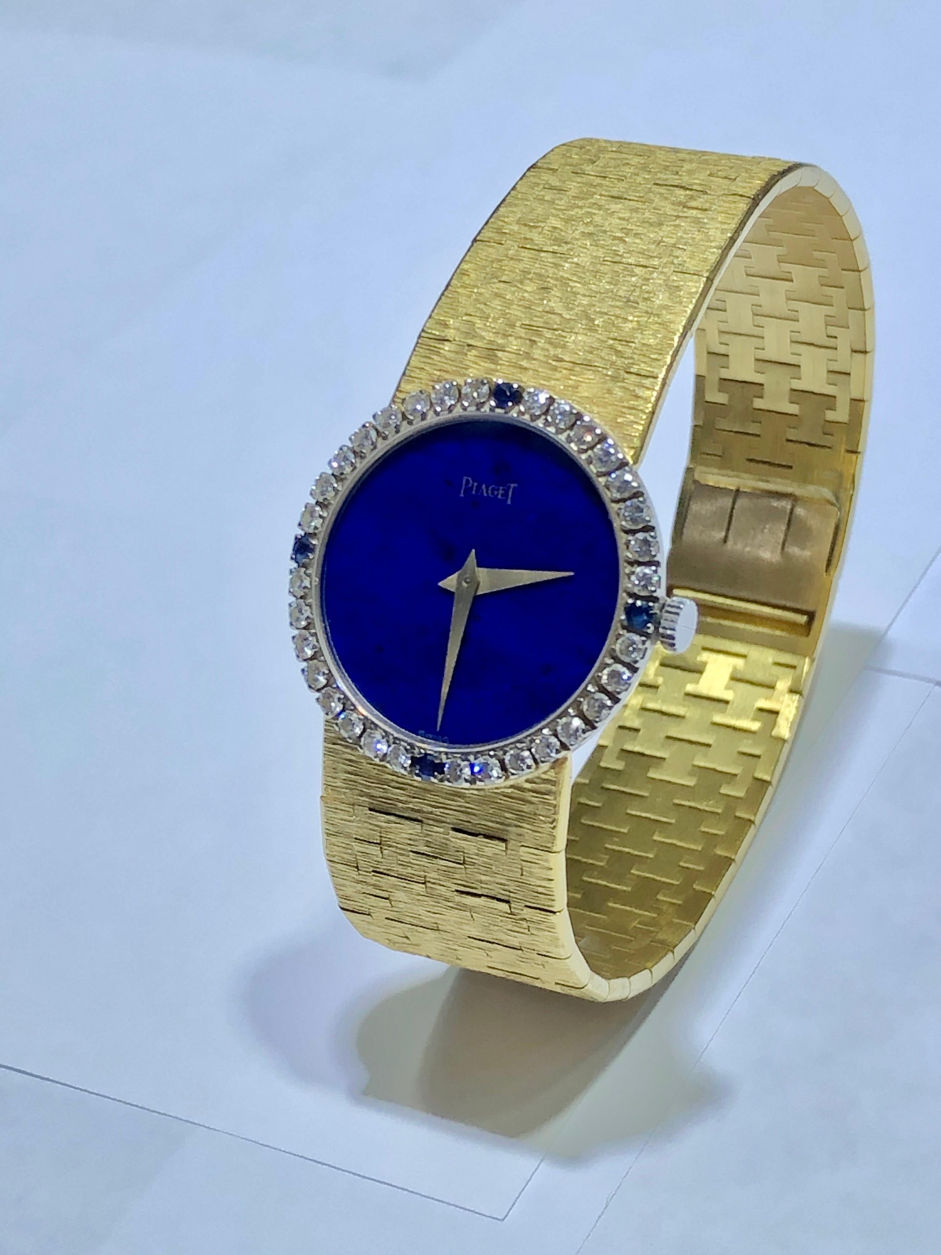 Ladies Piaget Classic in 18k yellow gold with diamond and sapphire bezel and lapis lazuli dial. Manual. Ref 9706A6. Fine Pre-owned Piaget Watch.

Piaget Classic 9706A6 watch is made out of yellow gold on a 18k yellow gold bracelet with a 18k yellow