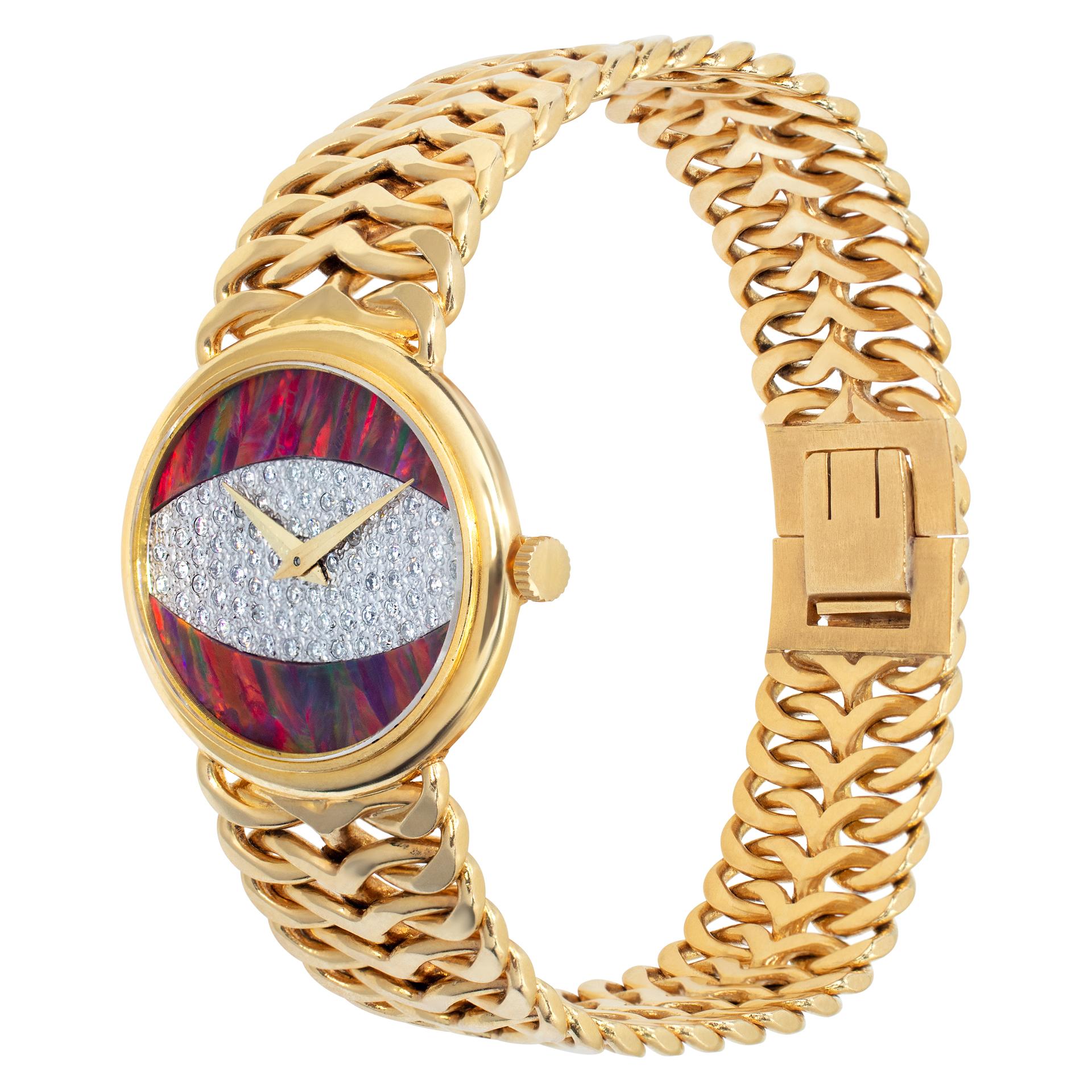 Piaget watch in 18k yellow gold with opal and pave diamond dial. Manual. 27 mm case size. 6 inch length. Ref 9802n90. Fine Pre-owned Piaget Watch. Certified preowned Classic Piaget Classic 9802n90 watch is made out of yellow gold on a 18k bracelet