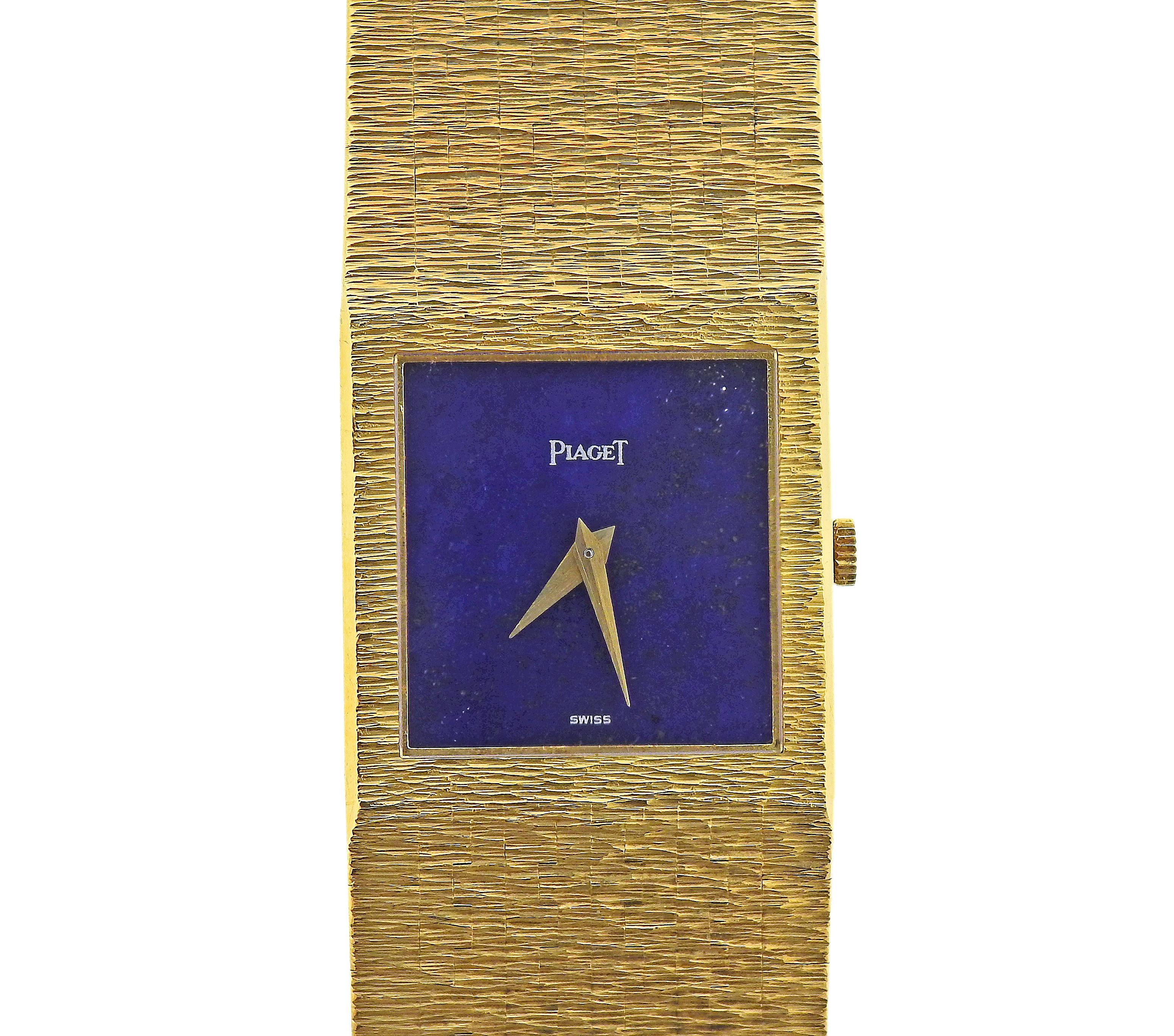 Classic 18k yellow gold Piaget watch, with lapis dial. Manual wind movement. Bracelet is 7 6/8