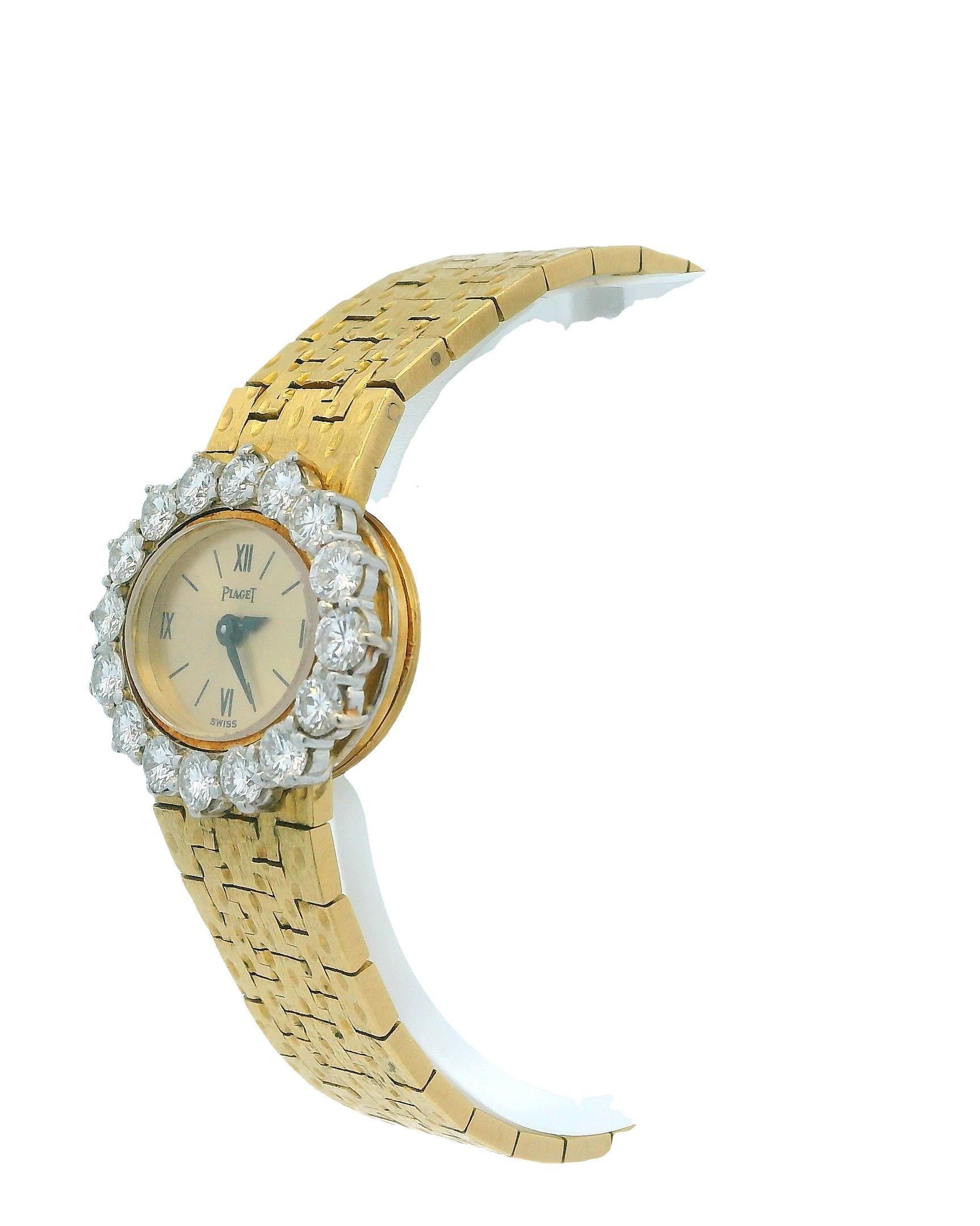 Piaget Vintage Cocktail 3867 Yellow Gold Ladies Watch, designed by Georges L'Enfant and retailed by VCA. It features a 20mm yellow gold case adorned with a factory-set diamond bezel. The champagne dial showcases black hands and Roman numeral hour