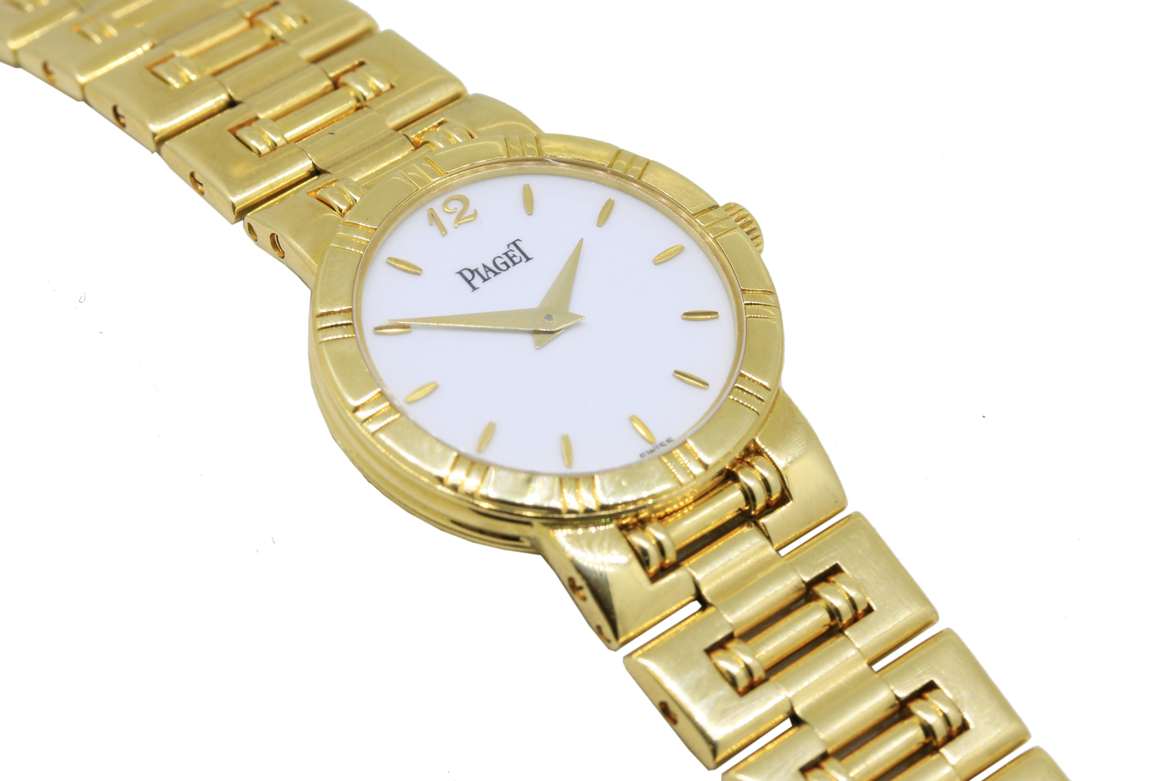 Piaget Dancer 18kt Gold Wrist Watch Circa 1990's
Featuring the famous dancer bracelet band 
White enamel dial 
Quartz Movement 
Fully serviced 2018
Excellent Condition
Cal 857P
Case Number: 80563  K81
Model Number: 558445