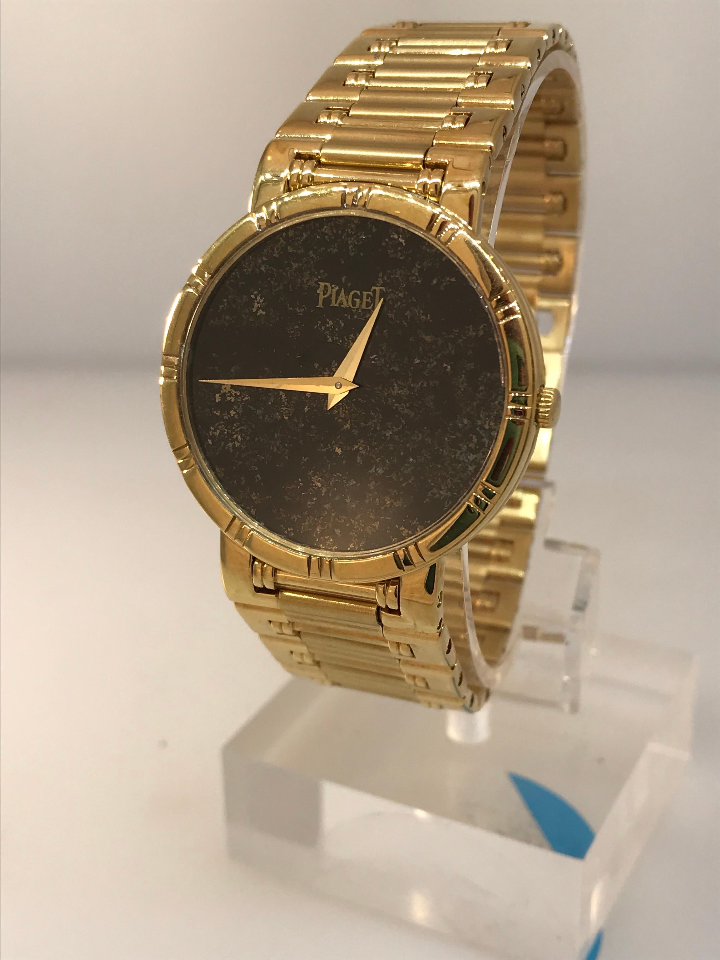 Piaget Dancer Men's Watch

MODEL NUMBER: 84023 K81

100% Authentic

New (old stock)

Comes with a generic watch box

18 Karat Yellow Gold Case & Bracelet

Onyx and Gold Dust Dial

Case Diameter: 32mm

Fits up to a 7.5 Inch Wrist