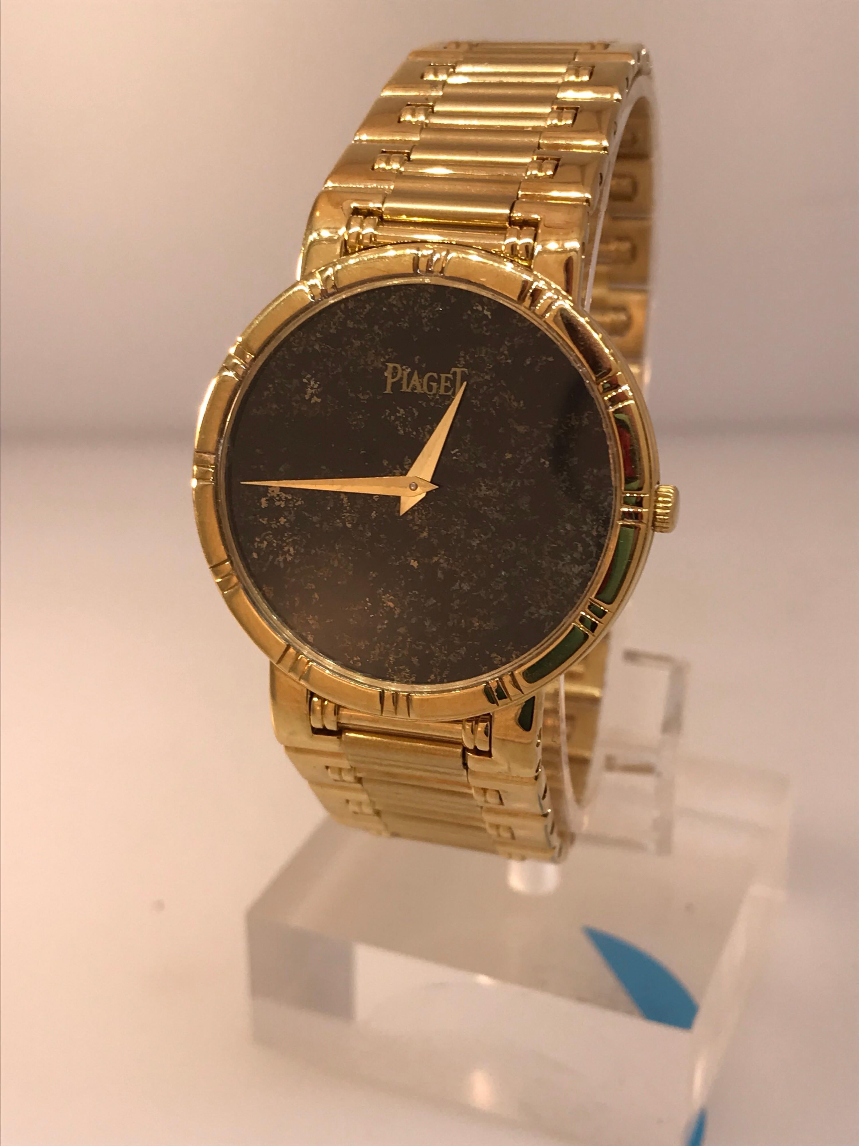 Piaget Dancer 18 Karat Yellow Gold Onyx Dial Men's Bracelet Watch 84023 K81 In Excellent Condition For Sale In New York, NY