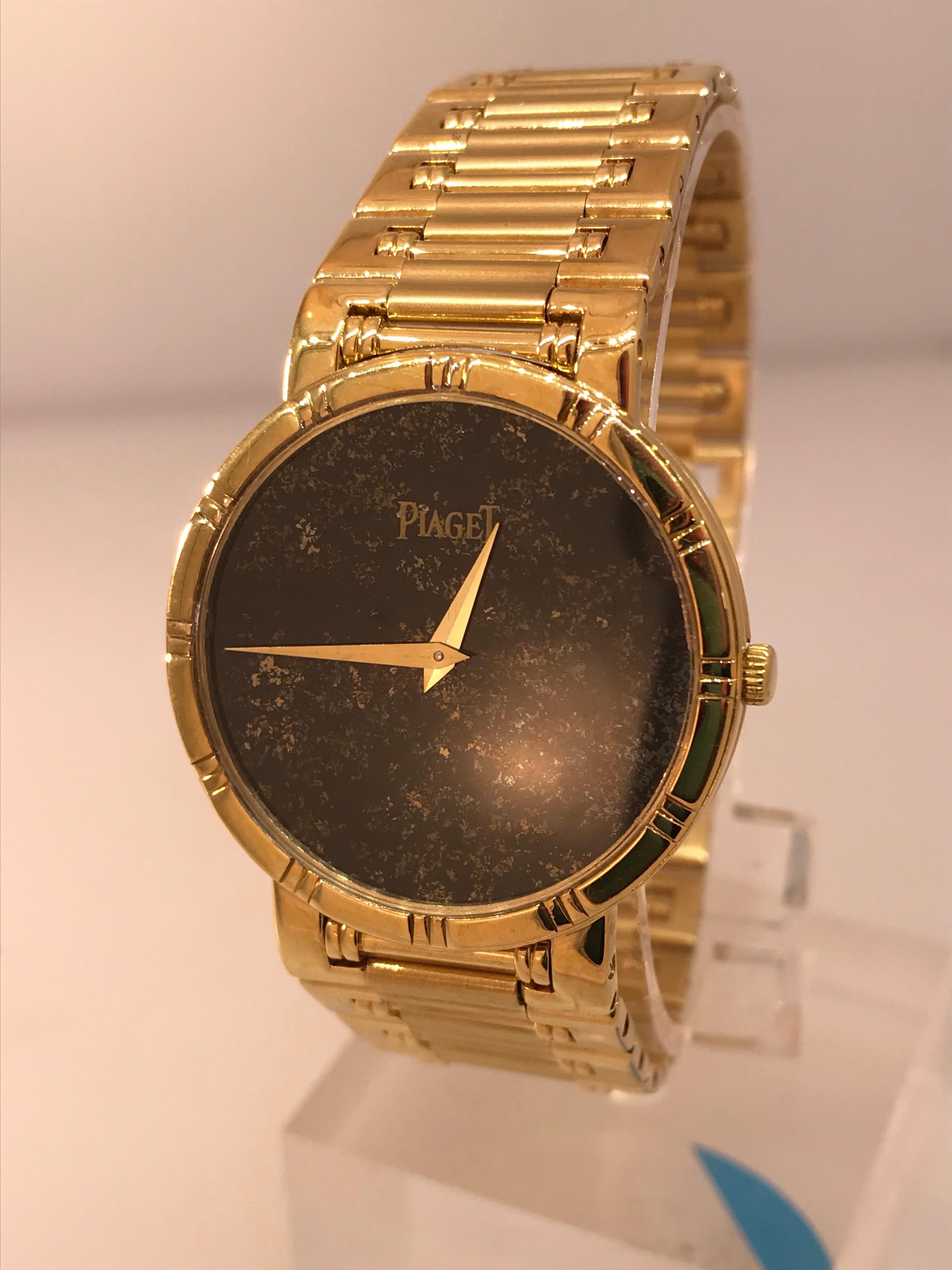 Women's or Men's Piaget Dancer 18 Karat Yellow Gold Onyx Dial Men's Bracelet Watch 84023 K81 For Sale