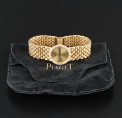 Piaget Dancer 9706 D23 sertie de diamants
Montre à remontoir manuel en or 18K de 24 mm