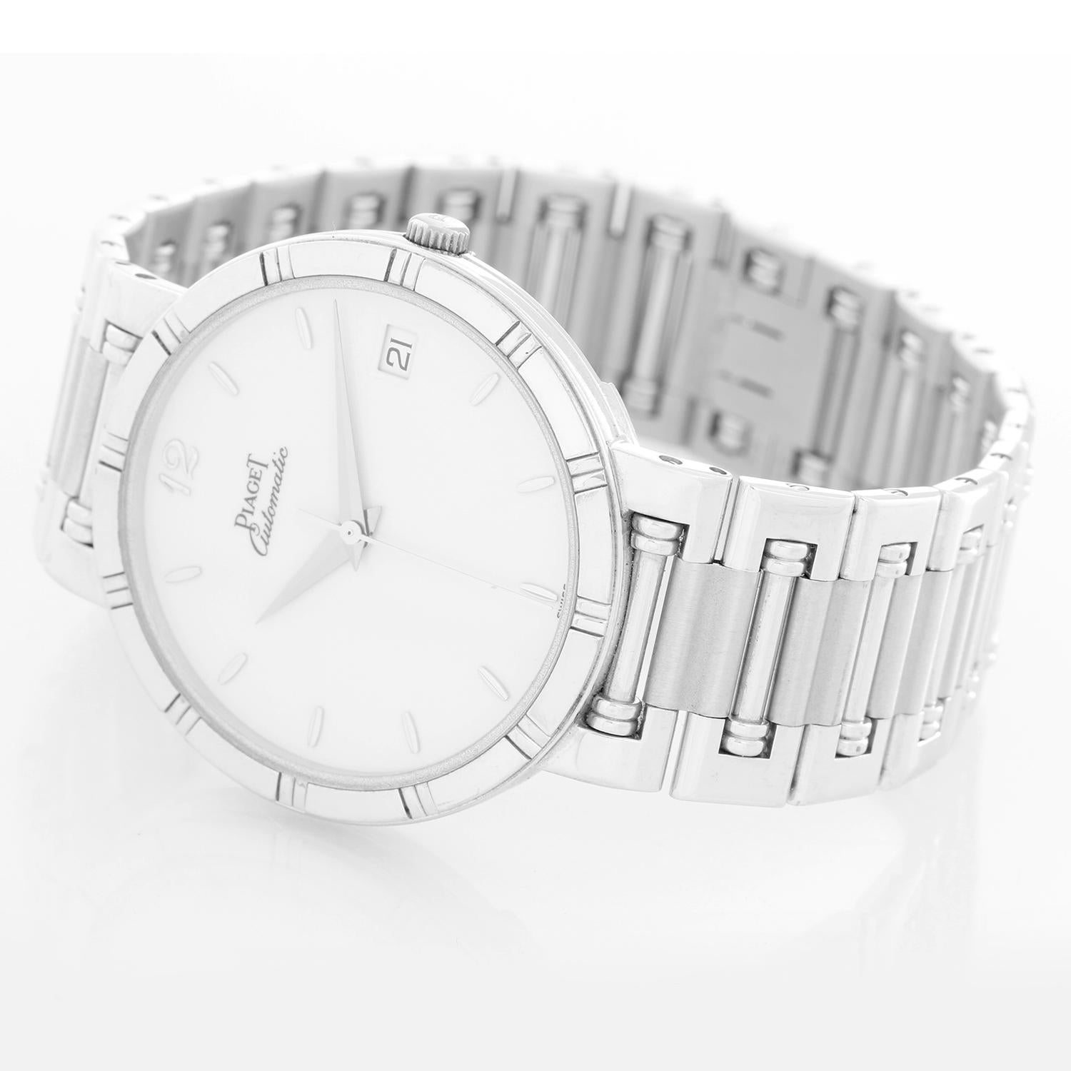 Piaget Dancer Men's 18k White Gold Watch - Automatic. 18k white gold case (31mm diameter). Silver dial. 18k white gold Piaget bracelet (will fit apx. 7-in. wrist). Pre-owned with Piaget box and books.