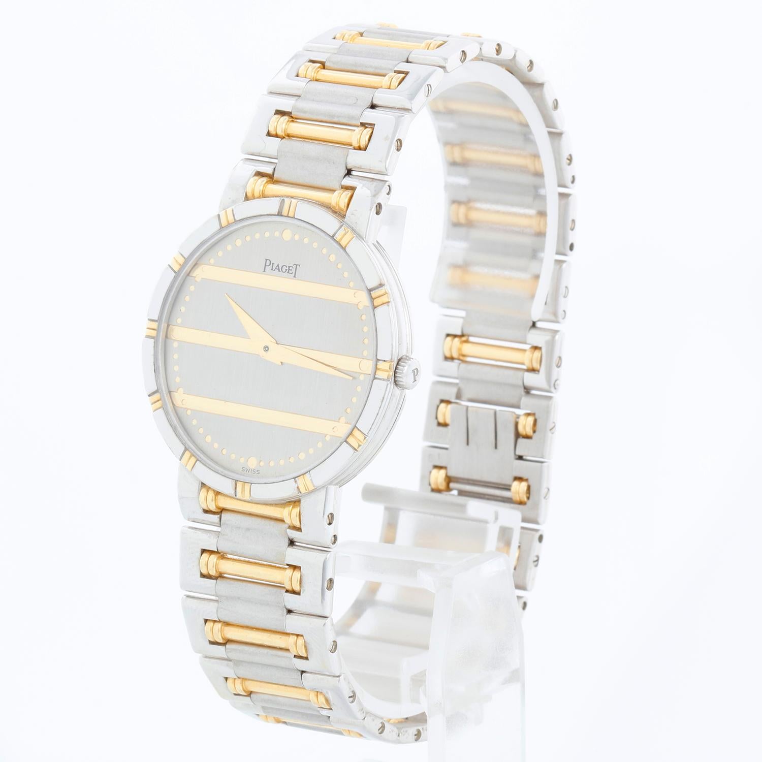 Piaget Dancer Men's 31mm 18k Yellow & White Gold Quartz Watch 84023 K81 - Quartz. 18k white gold case (31mm diameter). Silver dial with gold horizontal bars. 18k white gold bracelet with yellow gold links; will fit up to a 7.5 inch wrist. Pre-owned