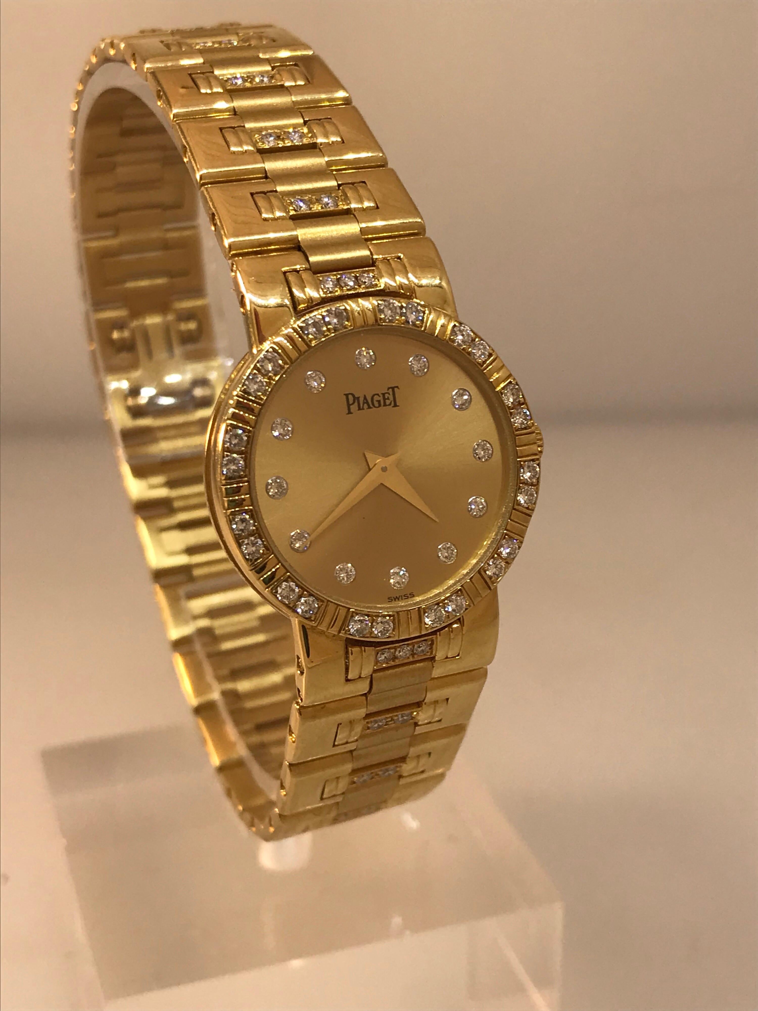 Piaget Dancer Ladies Watch

Model Number: 80564k818

100% Authentic

New / Old Stock

Comes with a generic watch box

18 Karat Yellow Gold Case & Bracelet

Diamond Bezel, Dial and Bracelet

Champagne Dial

Case Diameter: 23mm
