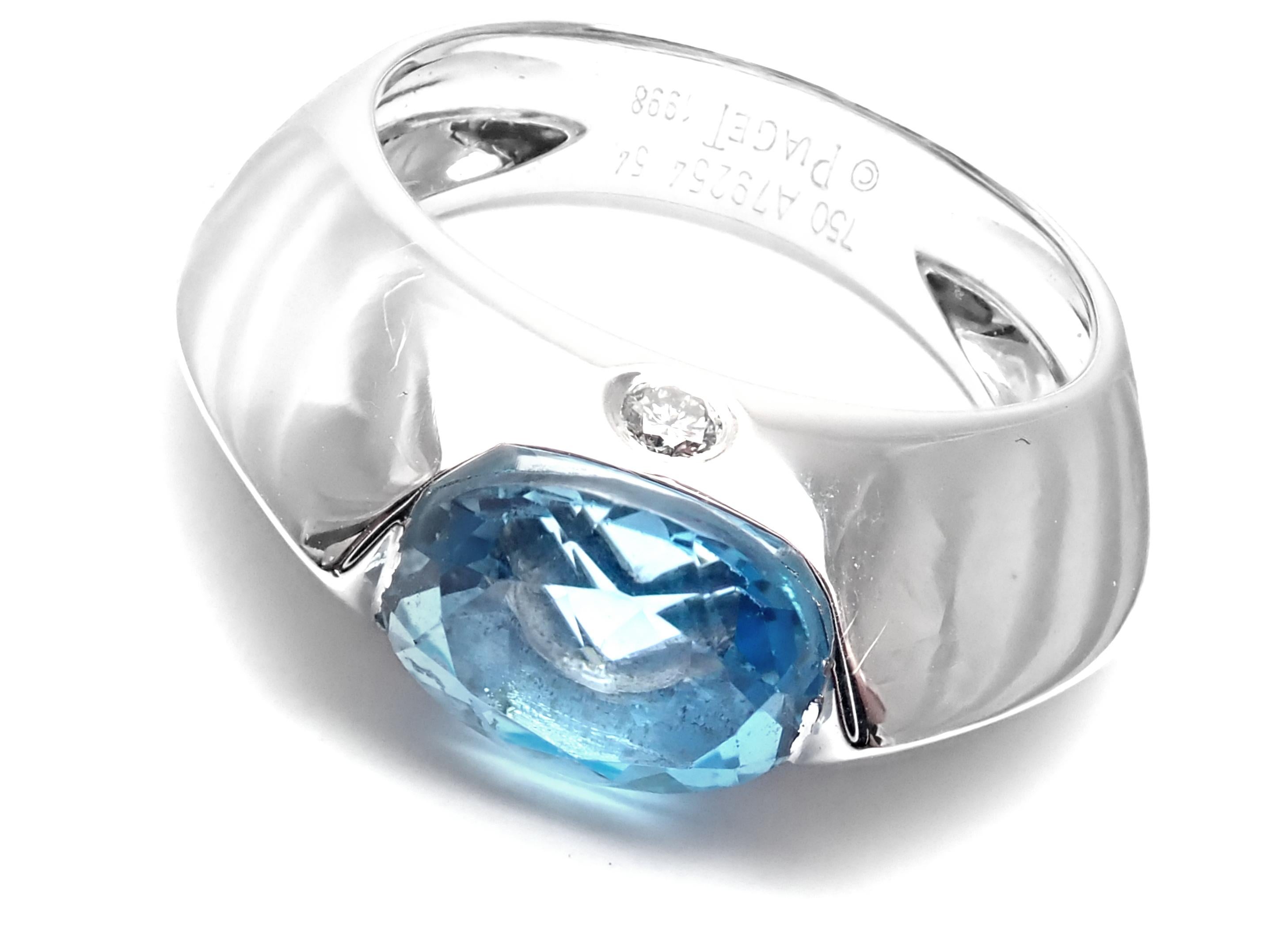 18k White Gold Blue Topaz Band Ring by Piaget. 
With 1 brilliant round cut diamonds approx .02 ctw
1 blue topaz approx 7.5 x 8mm
Details: 
Size: European 54 or US 6.75, 
Width: 5mm-7mm band
Weight: 11.6 grams
Stamped Hallmarks: 750 A79254 54 PIaget 