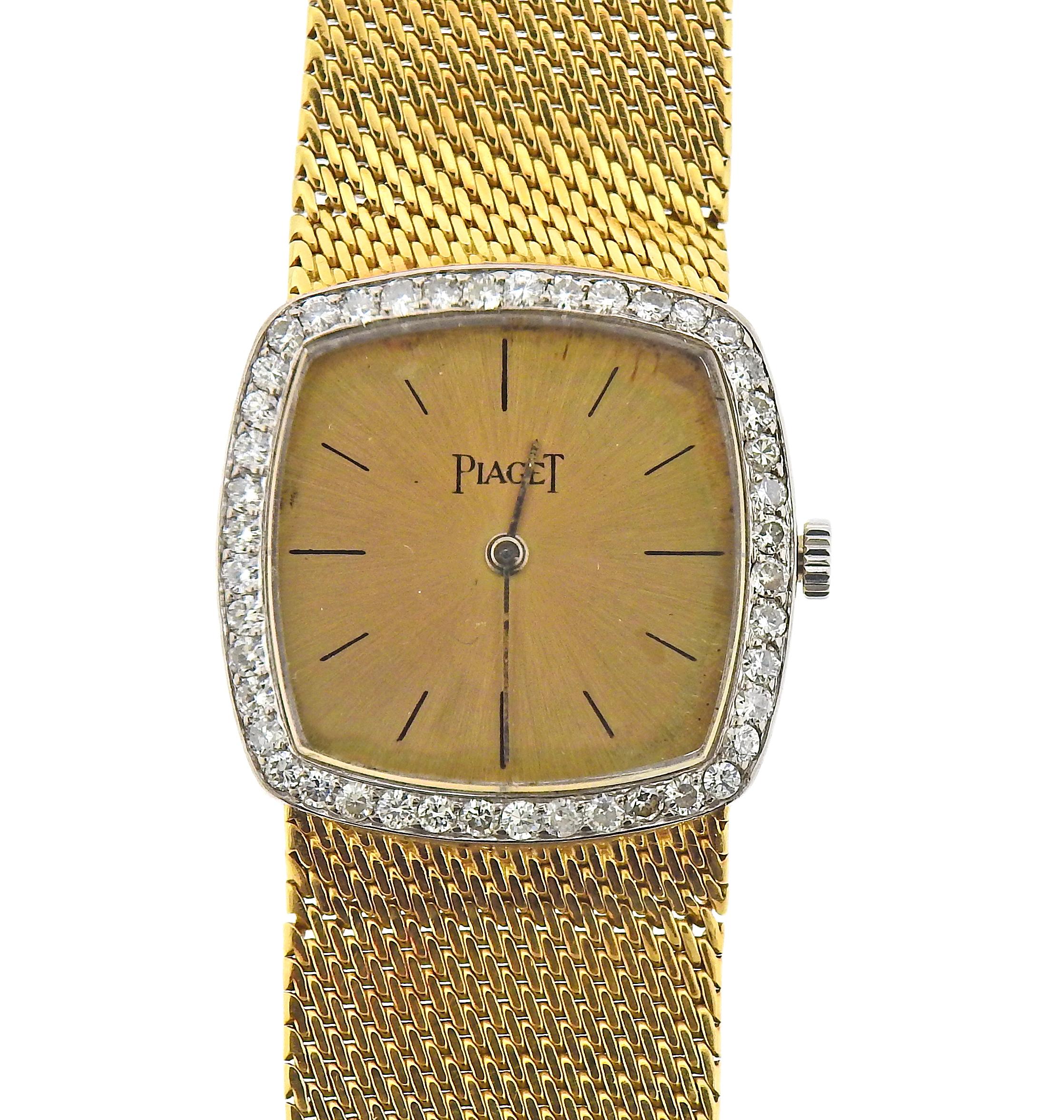 Classic Piaget 18k gold lady's watch, decorated with diamonds on the bezel, with manual wind movement. Case is 23mm x 23mm, excl the crown, bracelet is 6 6/8