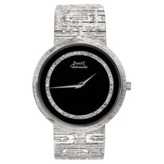 Piaget Montre automatique en or blanc 18 carats, onyx et diamants Réf. 12343