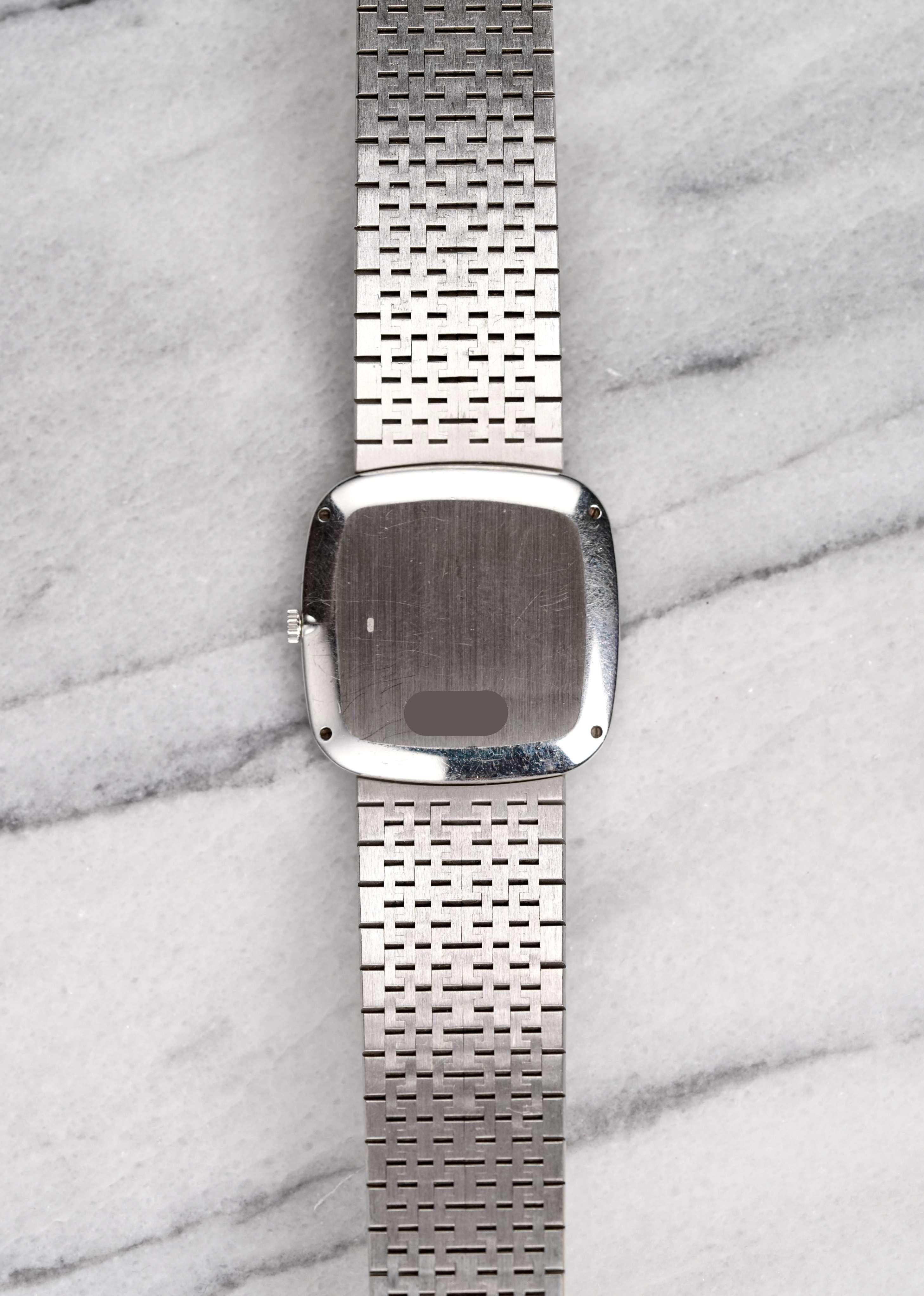 Here's a vintage Piaget reference 9775 with a factory diamond pave dial in 18K white gold from the 80s with a manual wind movement. Keeps great time and been recently serviced. Measurements include a 32mm case size across and an integrated bracelet
