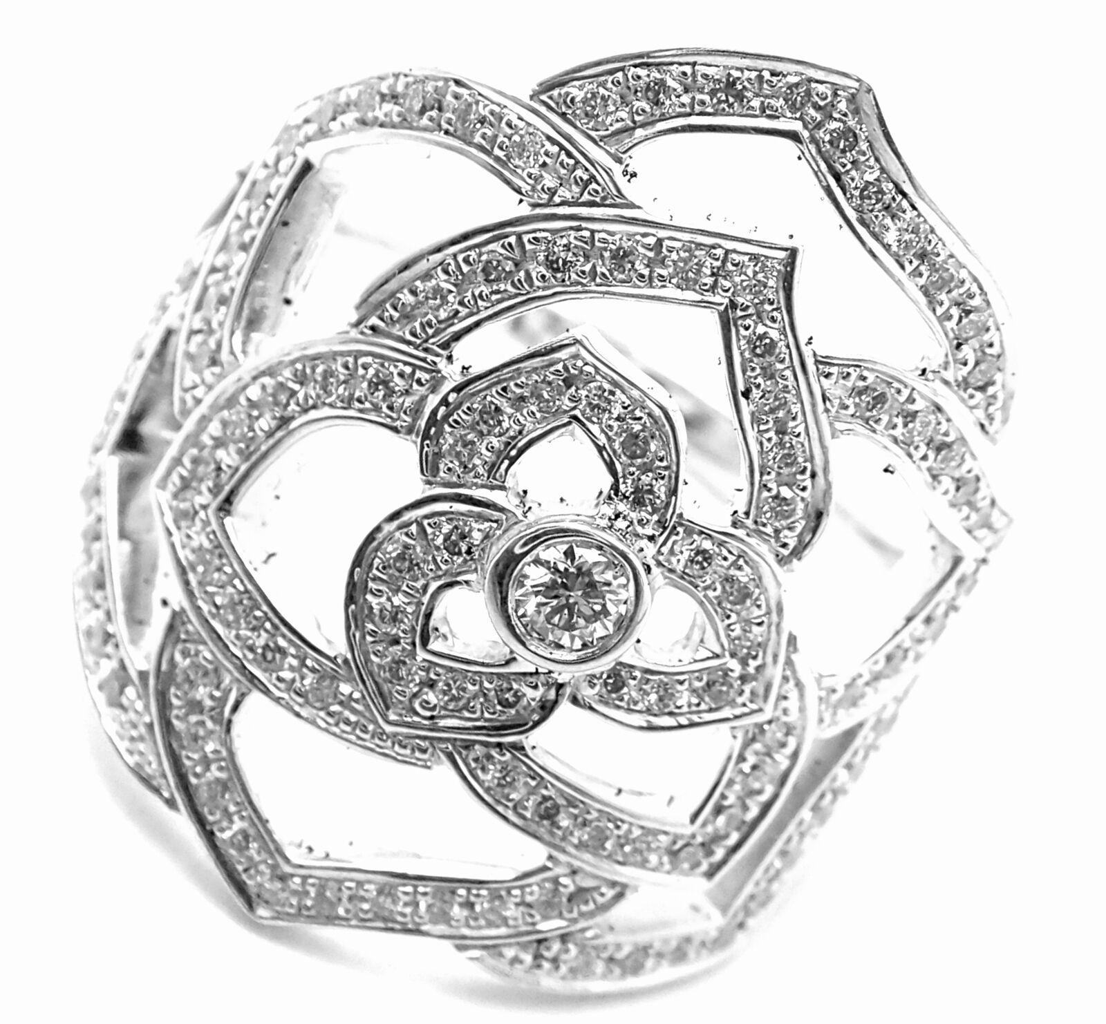18k White Gold Diamond Rose Flower Ring by Piaget. 
With 89 Round brilliant cut diamonds VS1 clarity, G color total weight approximately .45ct
This ring comes with Piaget box.
Details: 
Ring Size: European 52, US 6
Weight: 5.9 grams
Width: