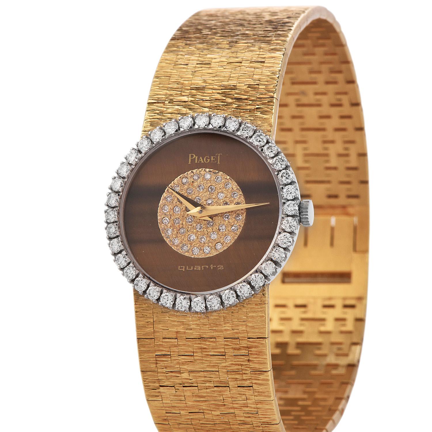 PIAGET Diamond 18k Gold Ladies Watch with tiger eye diamond dial and diamond bezel. all original, featuring  Factory set diamond in the center of the Genuine Tiger Eye dial and original diamond bezel. The bezel is set with 38 round brilliant cut