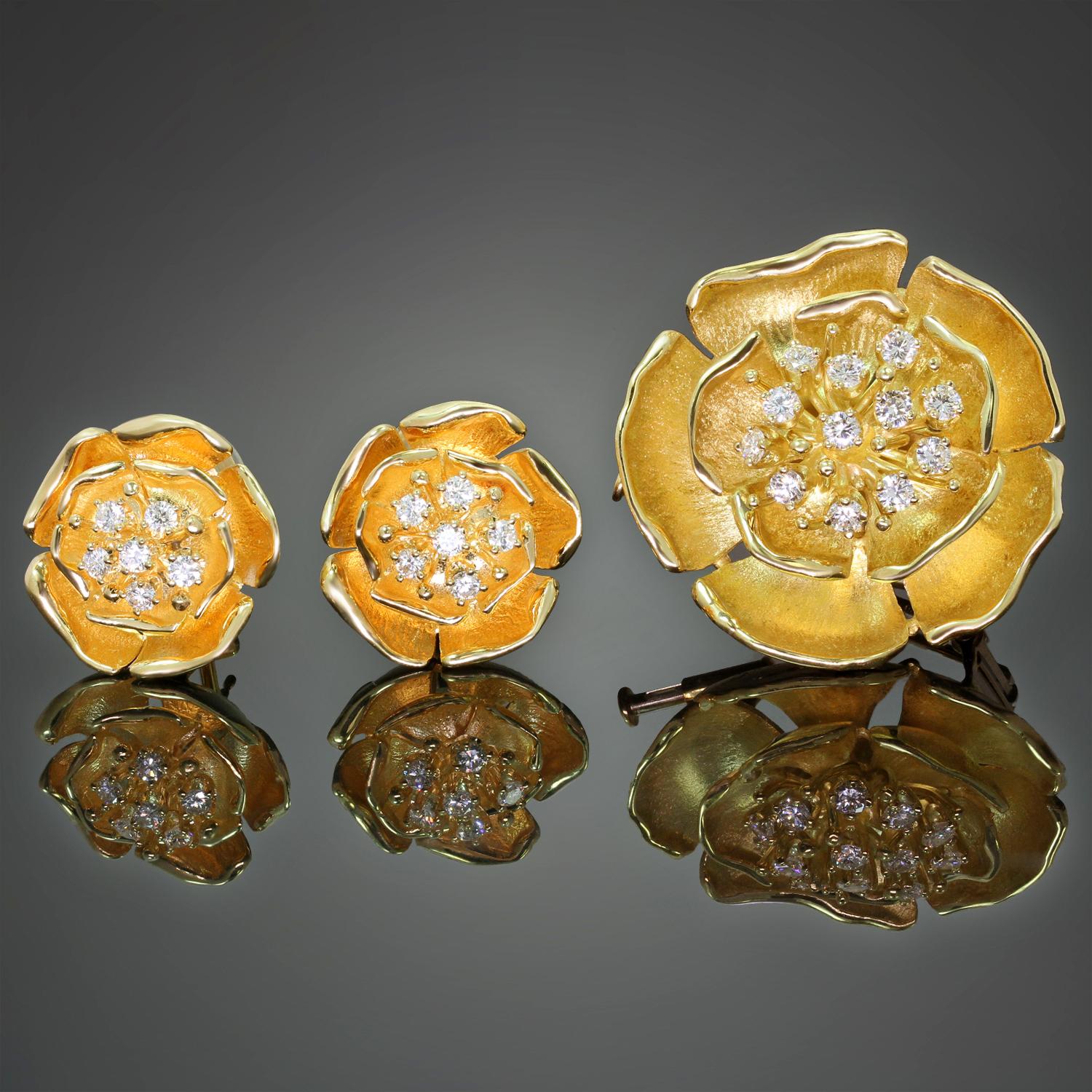 This exquisite Piaget earrings and brooch set features an elegant design of sparkling flowers crafted in 18k yellow gold and set with brililant-cut round F-G VVS1-VVS2 diamonds. The brooch can be worn as a pendant. Made in Switzerland circa 1990s.