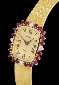 Piaget Dress Watch Women's 18k Yellow Gold Champagne Dial Ruby & Diamond Set