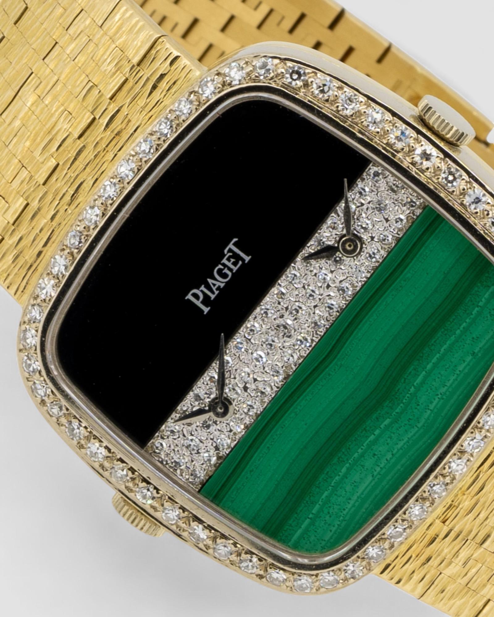 Piaget Dual Time 612775 A6 Malachit Onyx Diamanten Zifferblatt 18k Gelbgold 1980er

SKU 1416

Ein außergewöhnliches Beispiel für die Innovation und Eleganz von Piaget ist diese Dual Time Ref. 612775 A6 aus den 1980er-Jahren verbindet raffinierte