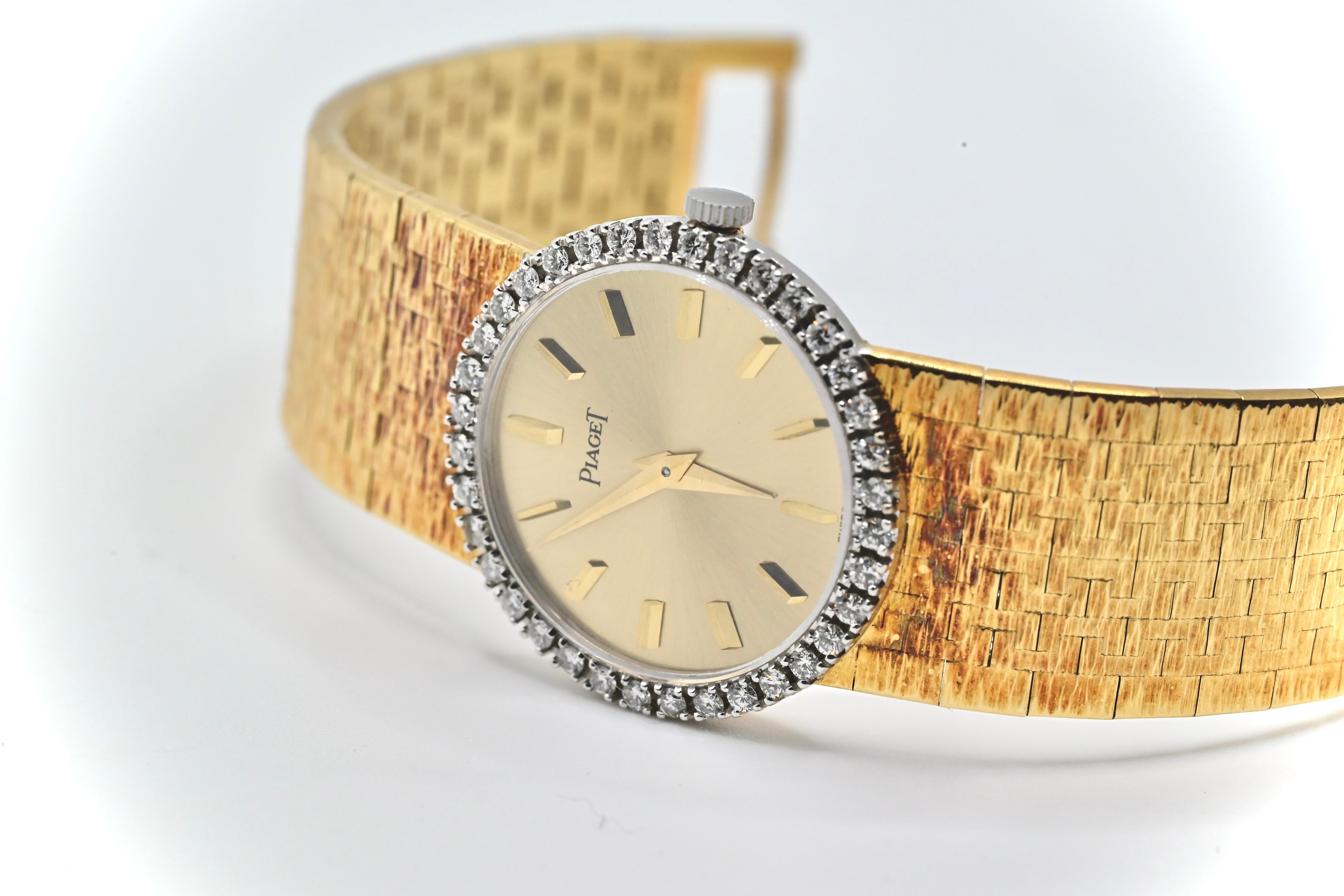 This is a beautiful classic Piaget ladies wristwatch made with 18k yellow gold and diamonds. It has a count of 36 exceptional round diamonds encrusted on the bezel of the watch. The case diameter is 24mm, and the strap length is approximately 6