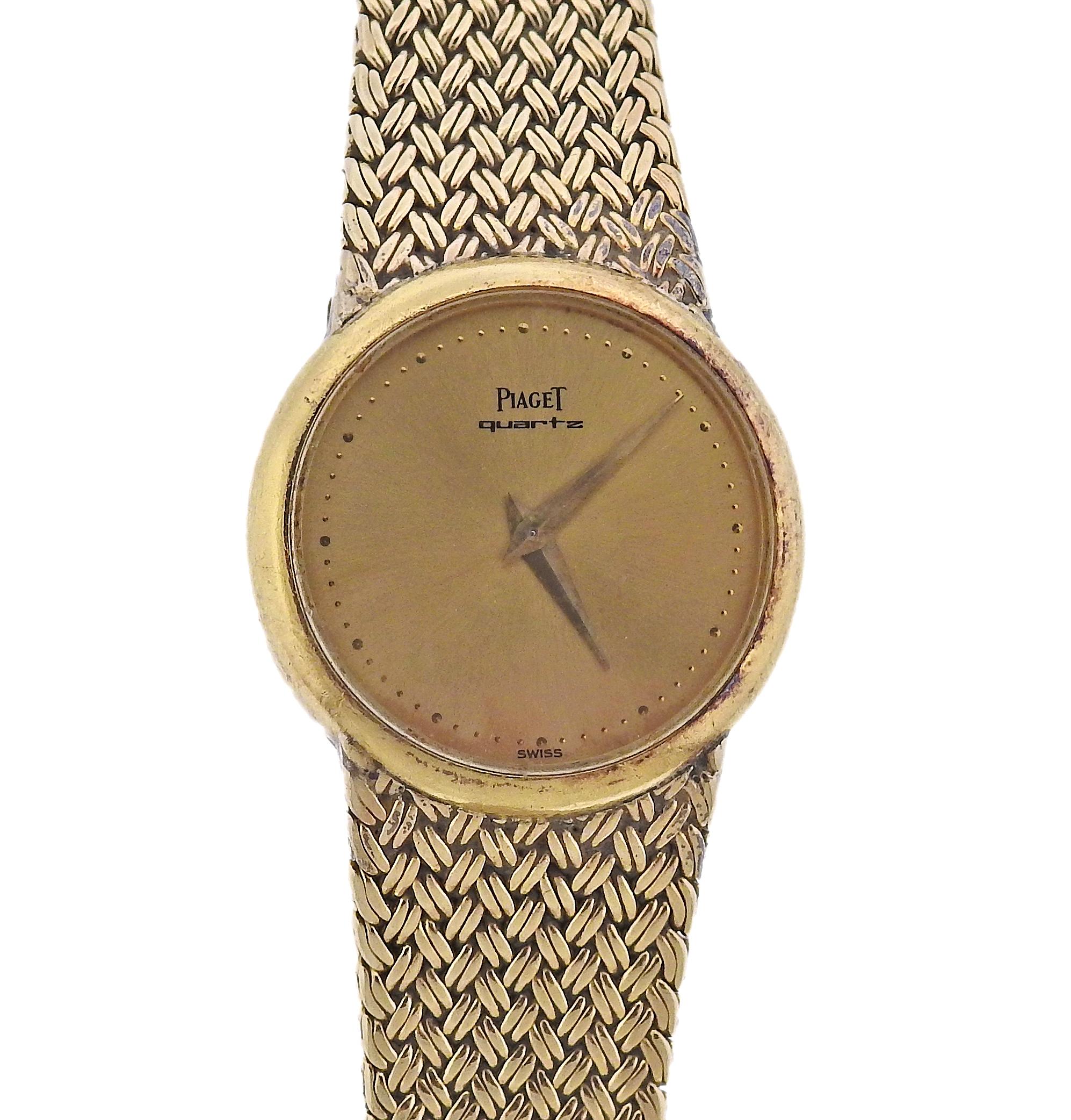 Vintage 14k gold Piaget backwind watch. Gold tone dial signed Piaget. Case is 25mm, bracelet is 6