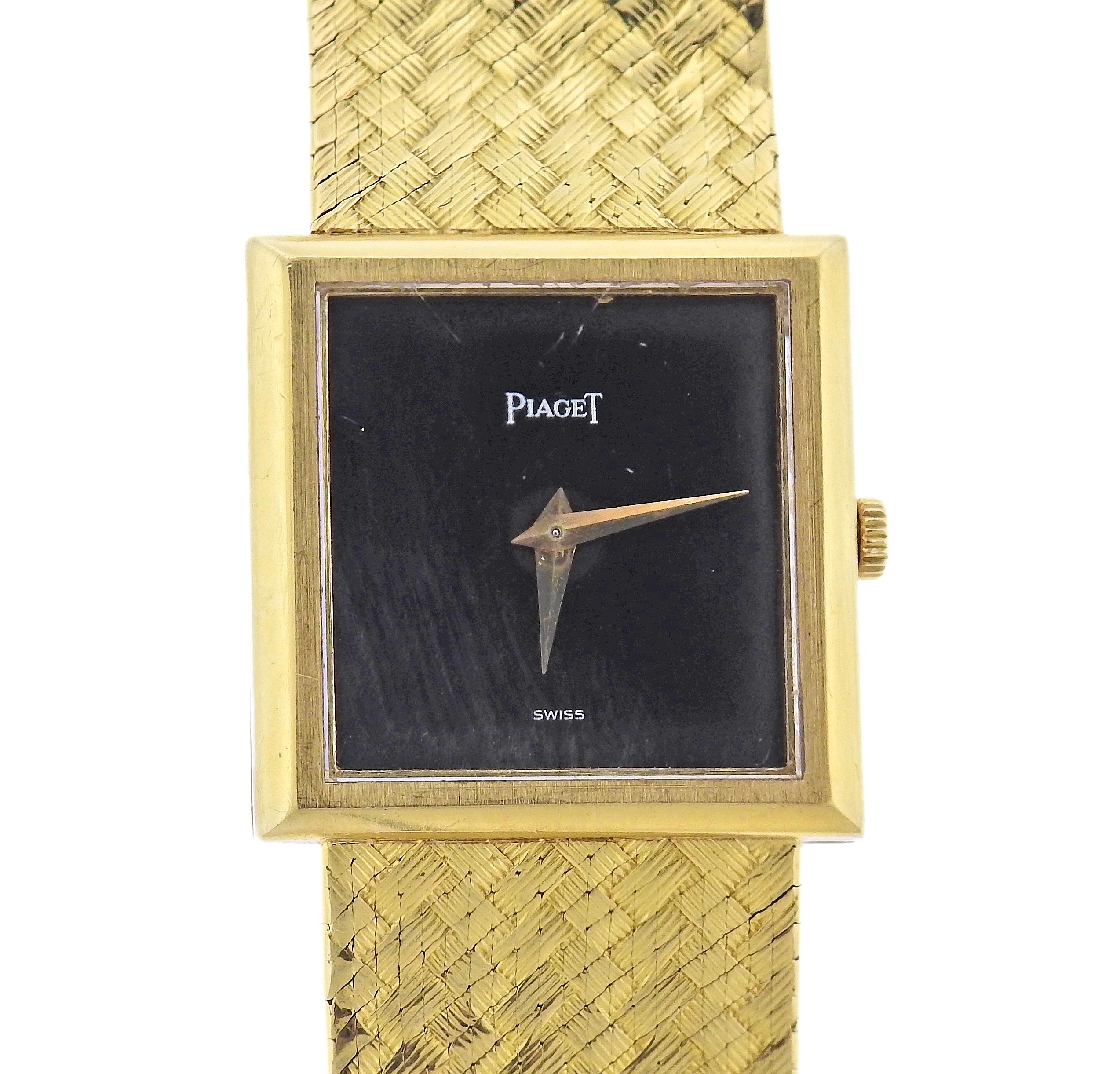 18k gold Piaget manual wind watch, with black diamond. Case is 22mm x 23mm. Bracelet is 6.5