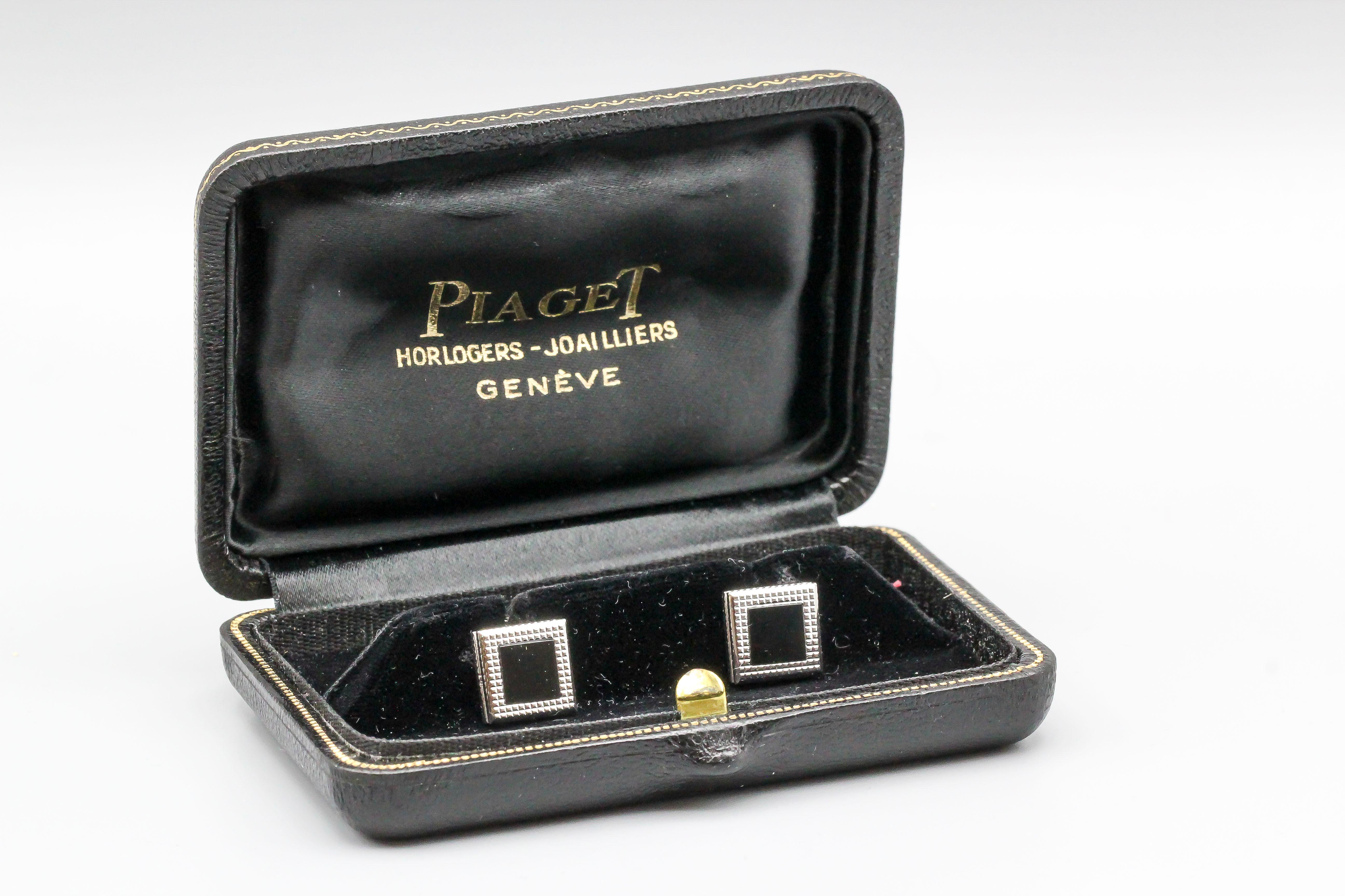 Handsome inlaid onyx and 18K white gold engine turned cufflinks by Piaget, circa 1970s. With original box.

Hallmarks: Piaget, 750.
