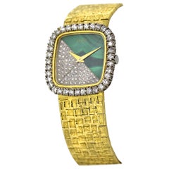 Piaget, Ladies 18 Karat Gold, Diamond and Malachite Manual Wind Bracelet Watch