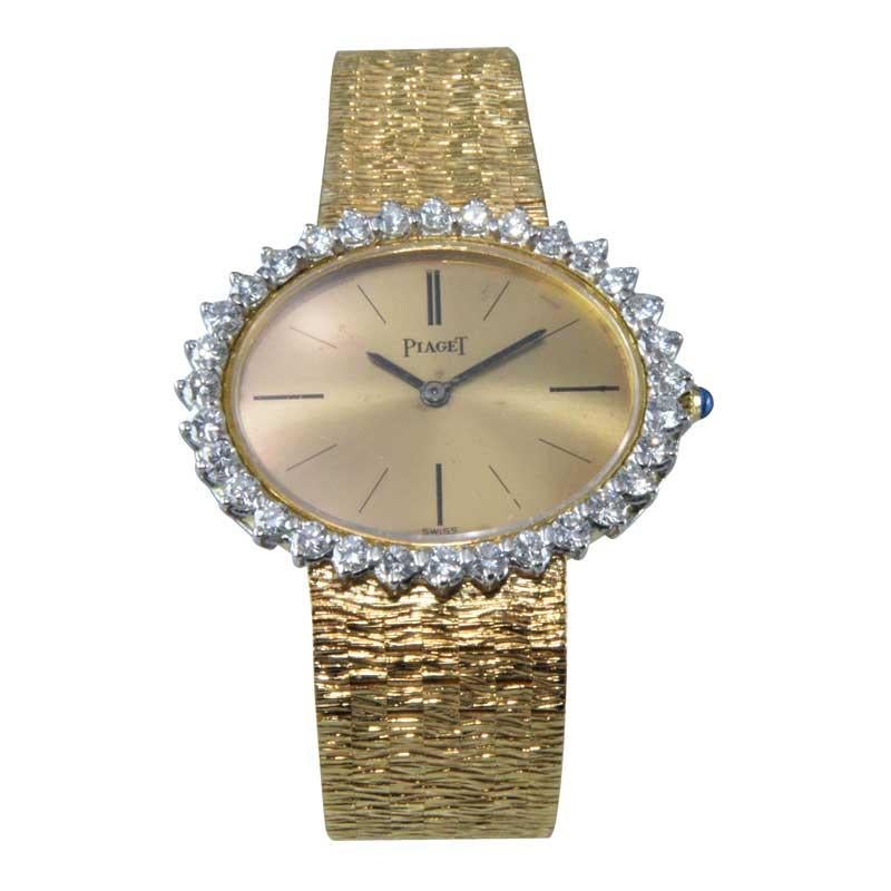 FACTORY / HOUSE: Piaget Watch Company
STYLE / REFERENCE: Bracelet Dress Watch / Ref. 9801
METAL / MATERIAL:  18kt Yellow Gold
CIRCA / YEAR: 1970's
DIMENSIONS / SIZE: 26mm x 29mm 
MOVEMENT / CALIBER: Manual Winding / 18 Jewels / 9P 
DIAL / HANDS: