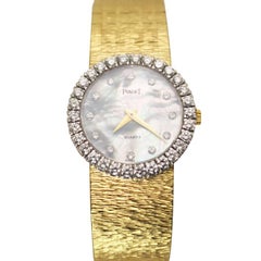 Piaget Ladies Gold and Diamond and Mother-of-pearl Dial Quartz Wrist Watch