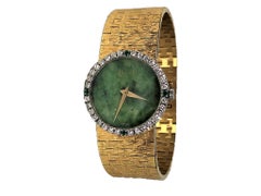 Piaget Ladies Gold Watch with Jade Dial, Diamond and Emerald Bezel