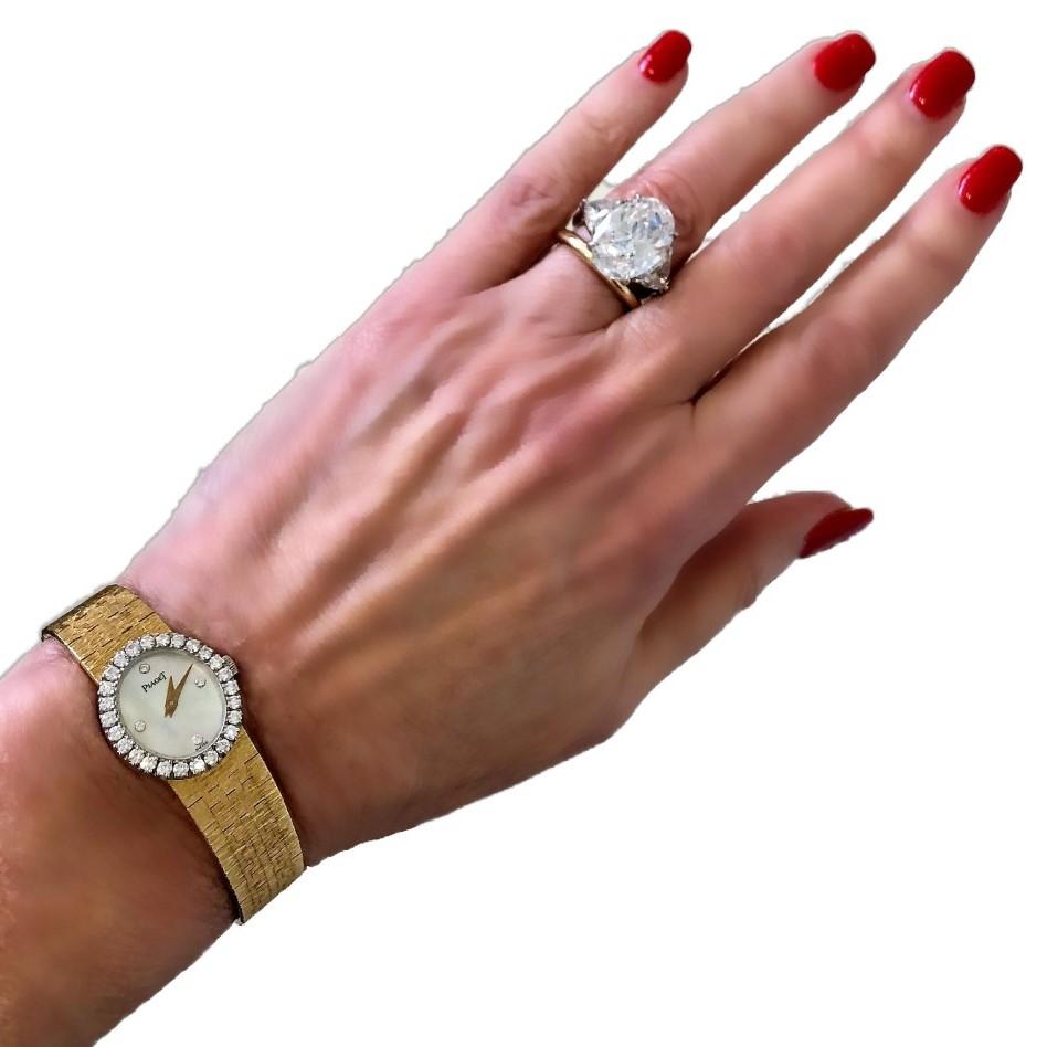 Piaget Ladies Petite Gold Watch with Mother of Pearl Diamond Dial/ Diamond Bezel 5