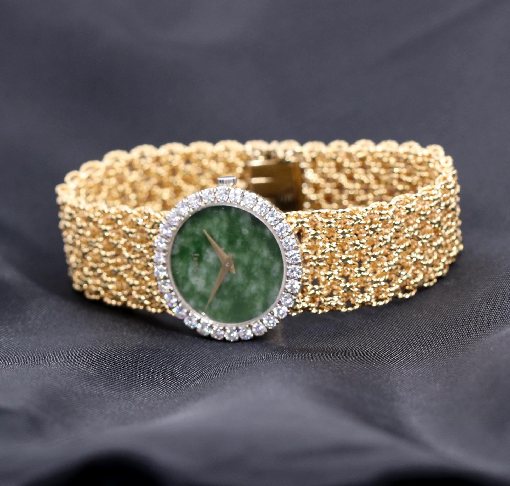 One ladies 18K yellow gold Piaget watch, centered around a round jade dial measuring approximately 20mm. Surrounding the beautiful green dial are 30 round brilliant cut diamonds weighing 1.75ct total approximate weight of overall F/G color and