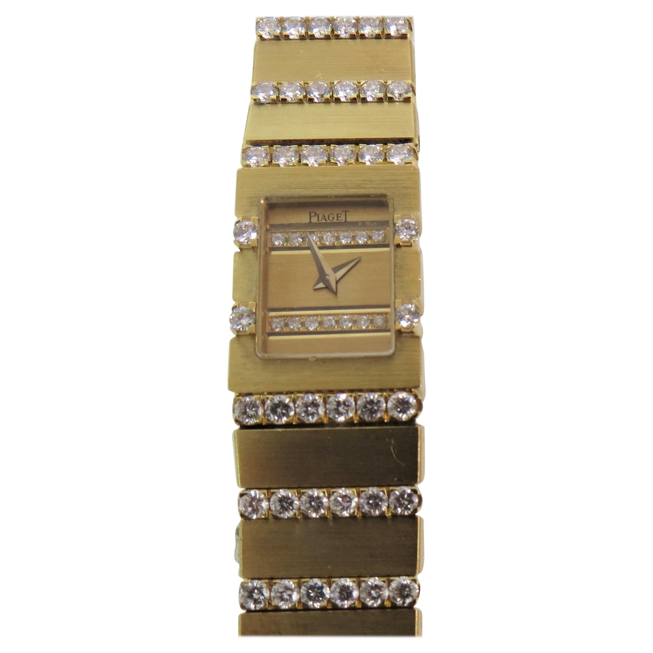 Brand new, never worn, 18K yellow gold diamond mini Piaget Polo bracelet watch, style: 15201MC606Y, serial number:505612, Gilt case, quartz movement, case size 17mm x 13mm. Diamonds on face, case and bracelet.
Brand new, never worn, two year