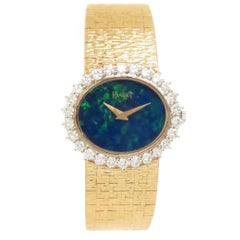 Piaget Ladies Yellow Gold Diamond Opal Dial Mechanical Wristwatch, circa 1980