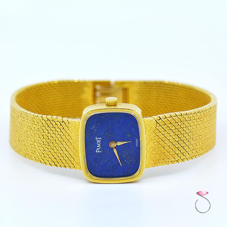 Rare vintage Piaget ladies bracelet watch in 18K yellow gold Ref. 6629 B68. Presented by Piaget in 1970, in a modern design for the era with a cushion shaped 18k yellow gold case that houses a vibrant blue lapis lazuli dial. The contrast of the blue