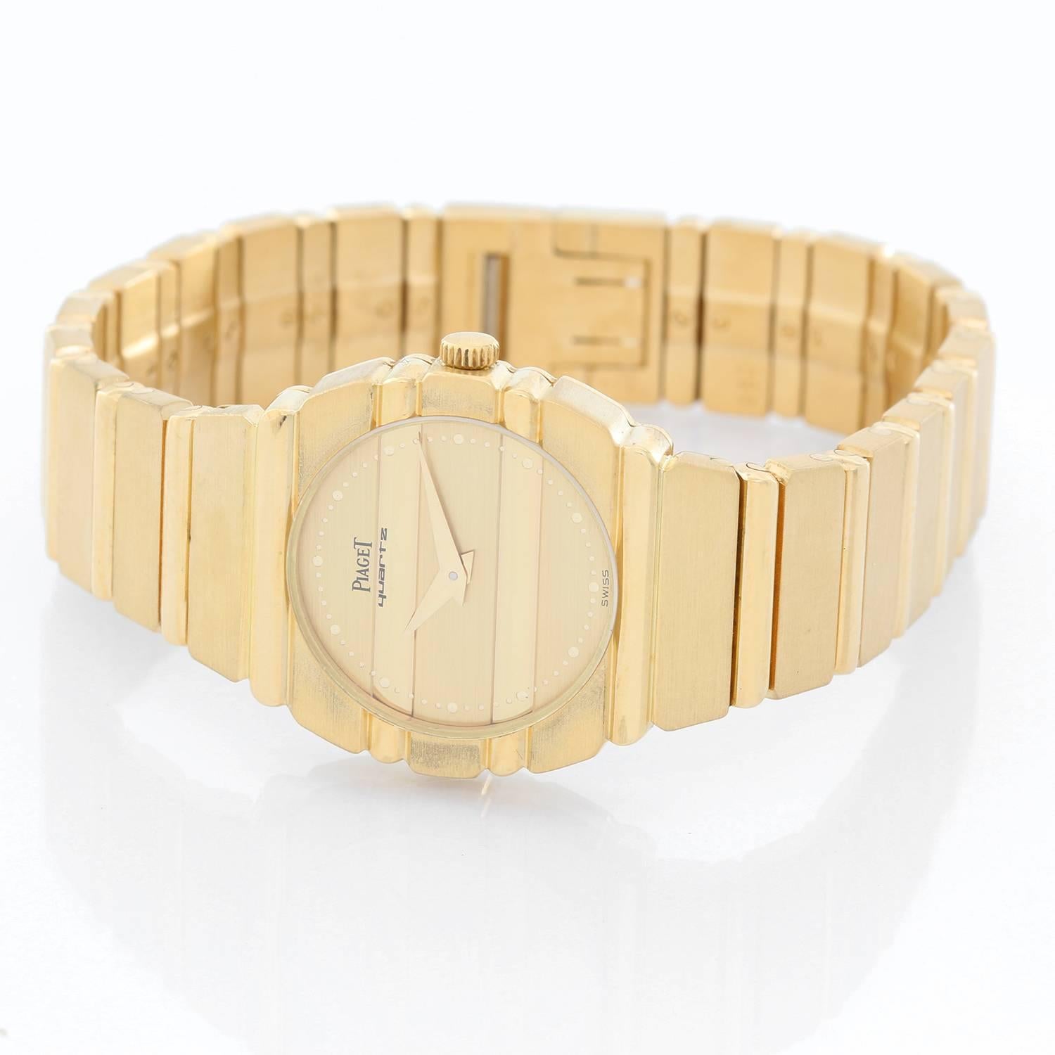 Piaget Polo Yellow Gold Watch Ladies -  Quartz. 18K Yellow gold ( 23 mm ). Gold dial. 18K Yellow Gold Bracelet. Pre-owned with custom box. Will fit a 6 inch wrist.