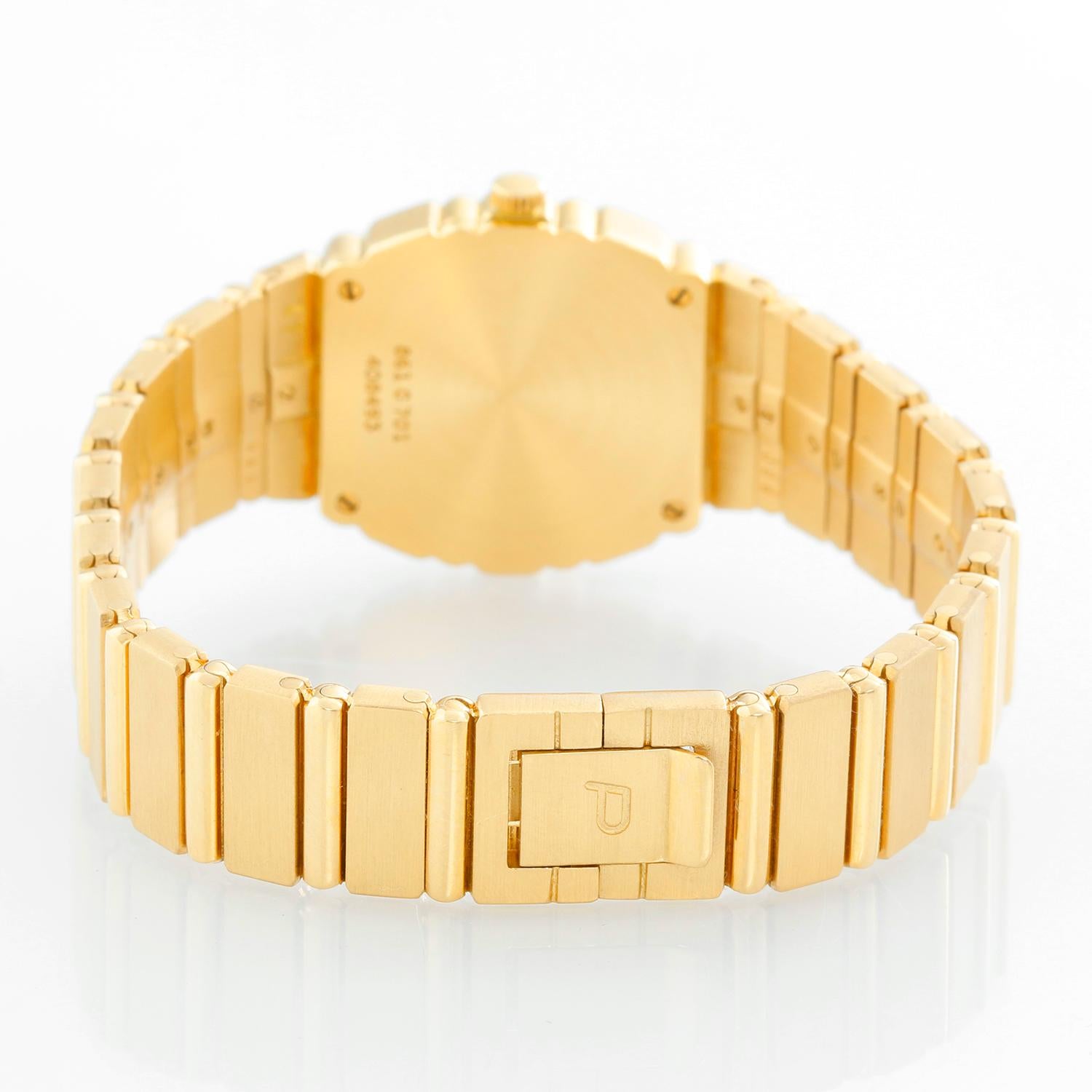 Piaget Polo Yellow Gold Watch Ladies -  Quartz. 18K Yellow gold ( 23 mm ). Gold dial. 18K Yellow Gold Bracelet. Pre-owned with custom box. Will fit a 6 inch wrist.