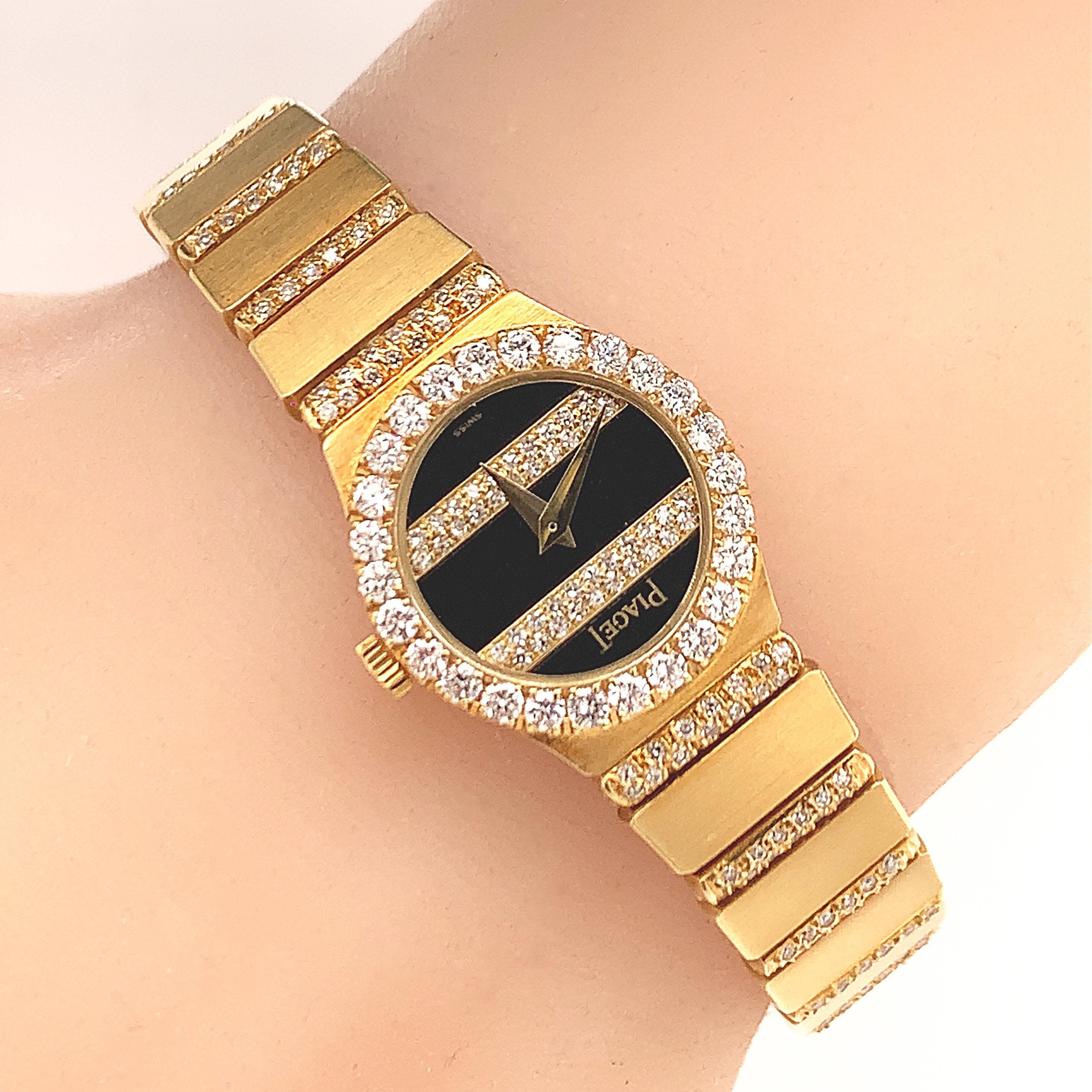 18K Y/gold Diamond with onyx dial watch, RBC and single cut diamonds weighing approx. 2.70 cts, EF VS, stamps PIAGET POLO 460797 846 0705 269 watch length 7 3/4 inches, weight 44.3 dwt.
Watch is not working and unlikely can be fixed 