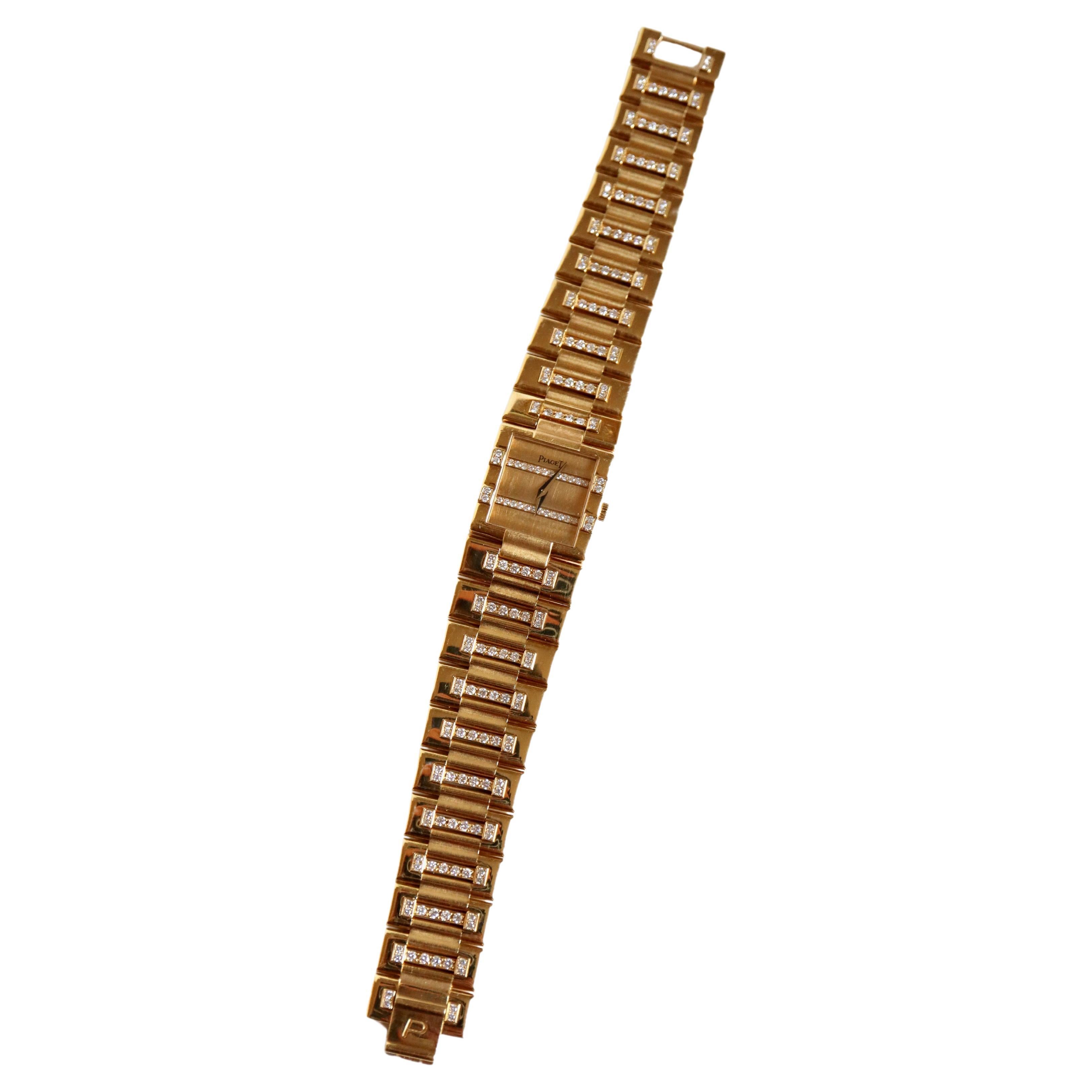 PIAGET ladies' watch in 18K Yellow Gold and Diamonds
PIAGET watch in 18-carat yellow gold paved with Diamonds, each link is paved with bars holding 8 Brilliant Cut diamonds and the dial paved with two bars of 16 Brilliant Cut diamonds for a total