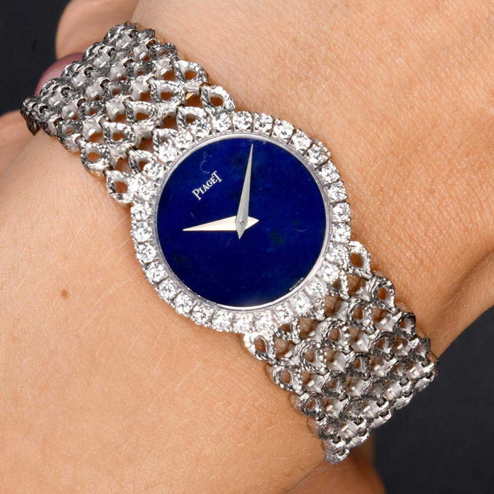 Vintage  Piaget's ladies' watch in solid 18-karat white gold. Full-length with a large face 

Embellished with factory set diamond. Sapphire Crystal, Genuine lapis Dial, 25mm case( without Crown), and 40 factory set round diamonds approx. 1.50