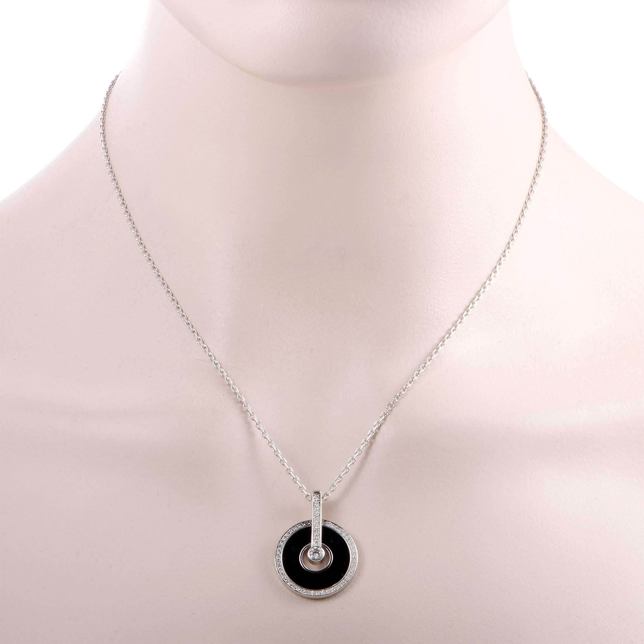 Extravagantly designed in classy 18K white gold, this unique pendant necklace by Piaget from the Limelight collection is truly spectacular! The incredible pendant features 0.65ct of sparkling diamonds and bold black onyx in its stunning design. A