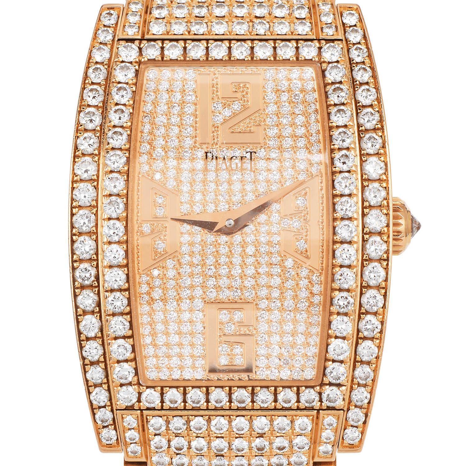 This Luxury Piaget Limelight Tonneau Diamond 18K Ladies Quartz Watch Is in 18k yellow gold with an original factory-set diamond with an 18kt yellow gold diamond bracelet. Diamond bezel set with diamond dial Diamond-set dials with yellow gold-tone