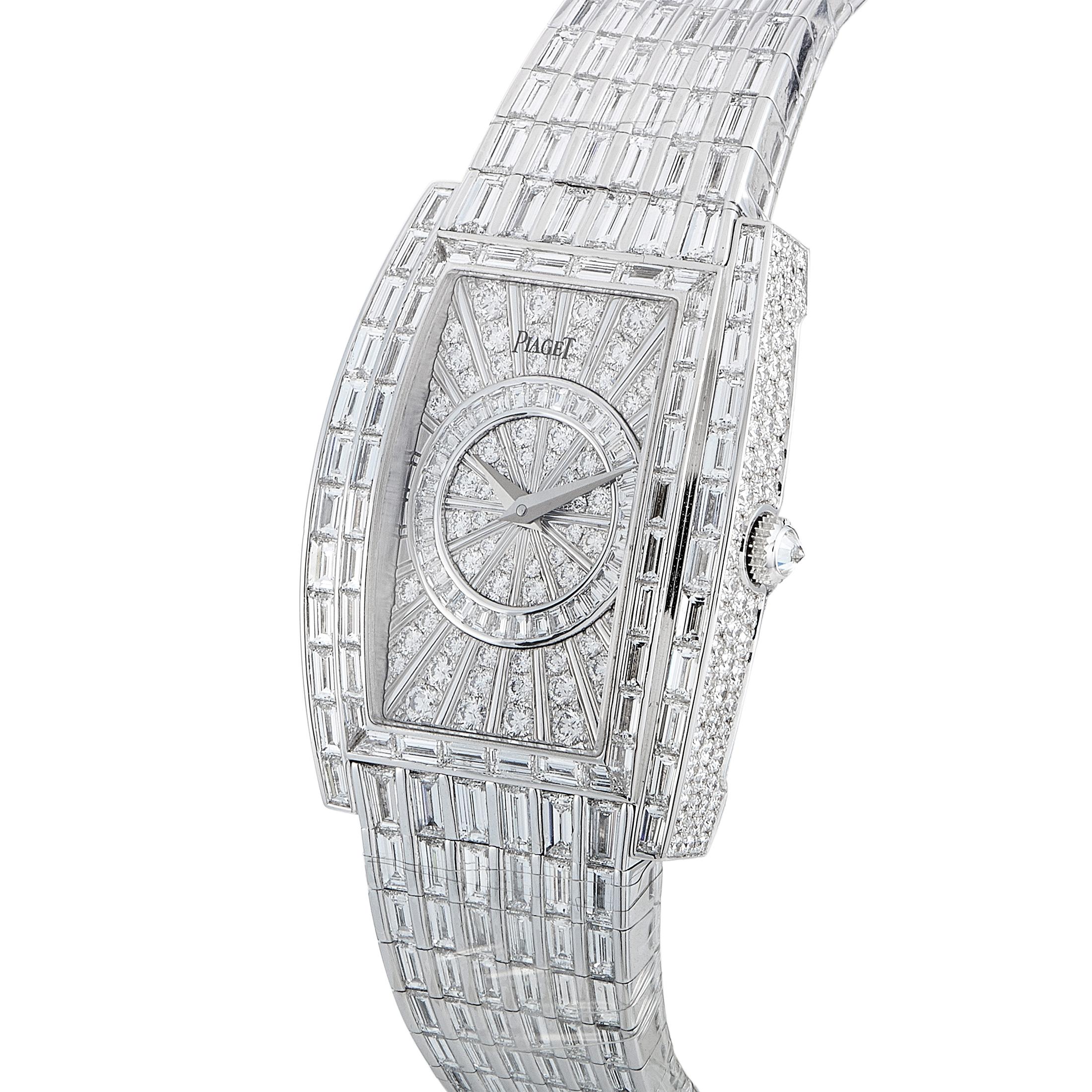 The Piaget Limelight watch, reference number G0A31054, is presented with a tonneau-shaped, diamond-set 18K white gold case that measures 28 by 38 mm. The case is mounted onto a matching diamond-set 18K white gold bracelet. The dial is set with