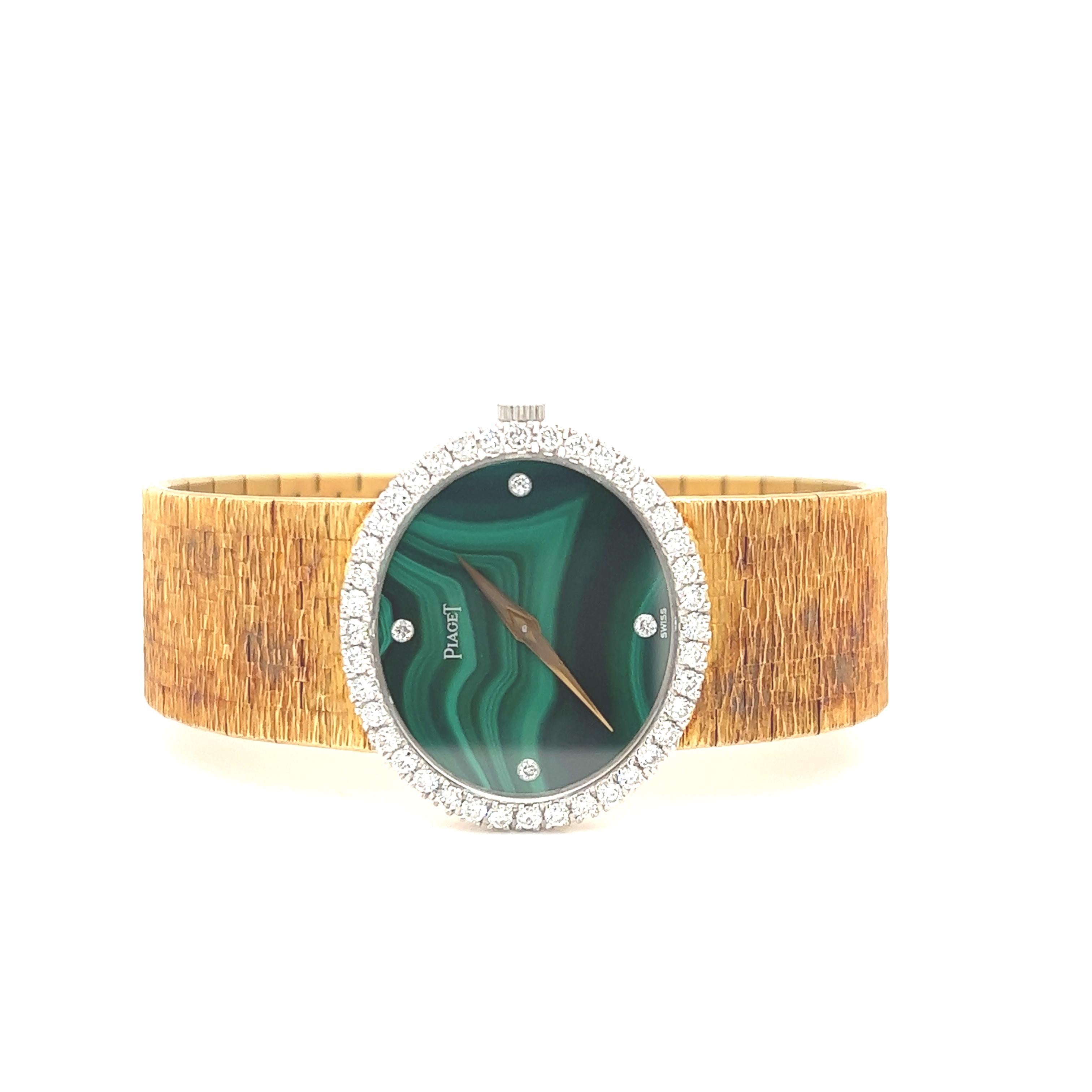 One of a kind beauty seen on this Retro Piaget ladies wrist watch. This fantastic watch is crafted in 18k yellow gold and is set with a malachite gemstone dial with diamond bezel and diamond markers. The watch is a reference 9806- A6.
 This watch is
